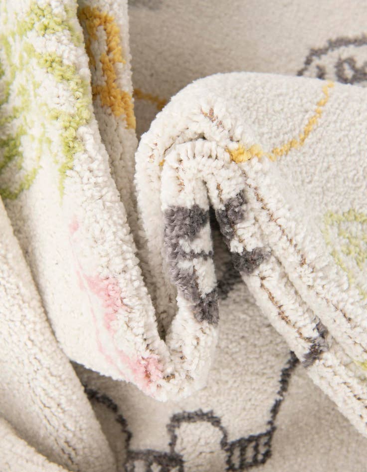 Detail image of  2' 2 x 3' 11 Dinosaur Whimsy Kids Runner Rug
