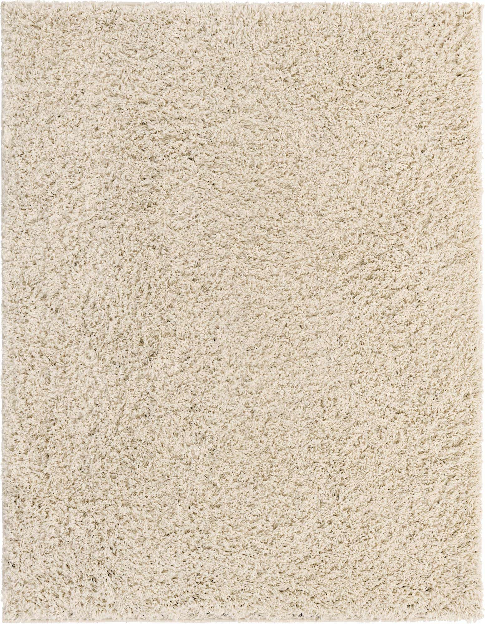 A soft, plush 3' 3 x 3' 3 square ivory shag rug, perfect for adding cozy texture to any room.