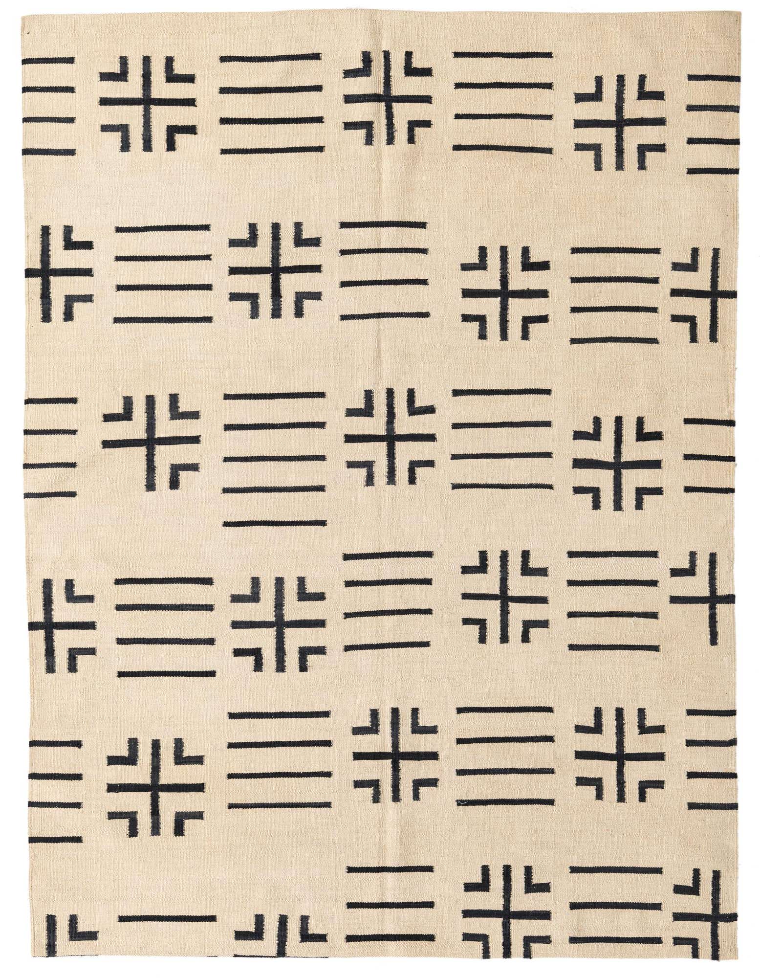 A 5' 4 x 6' 6 square ivory wool rug with a repeating black tribal geometric pattern, featuring horizontal lines and cross shapes.