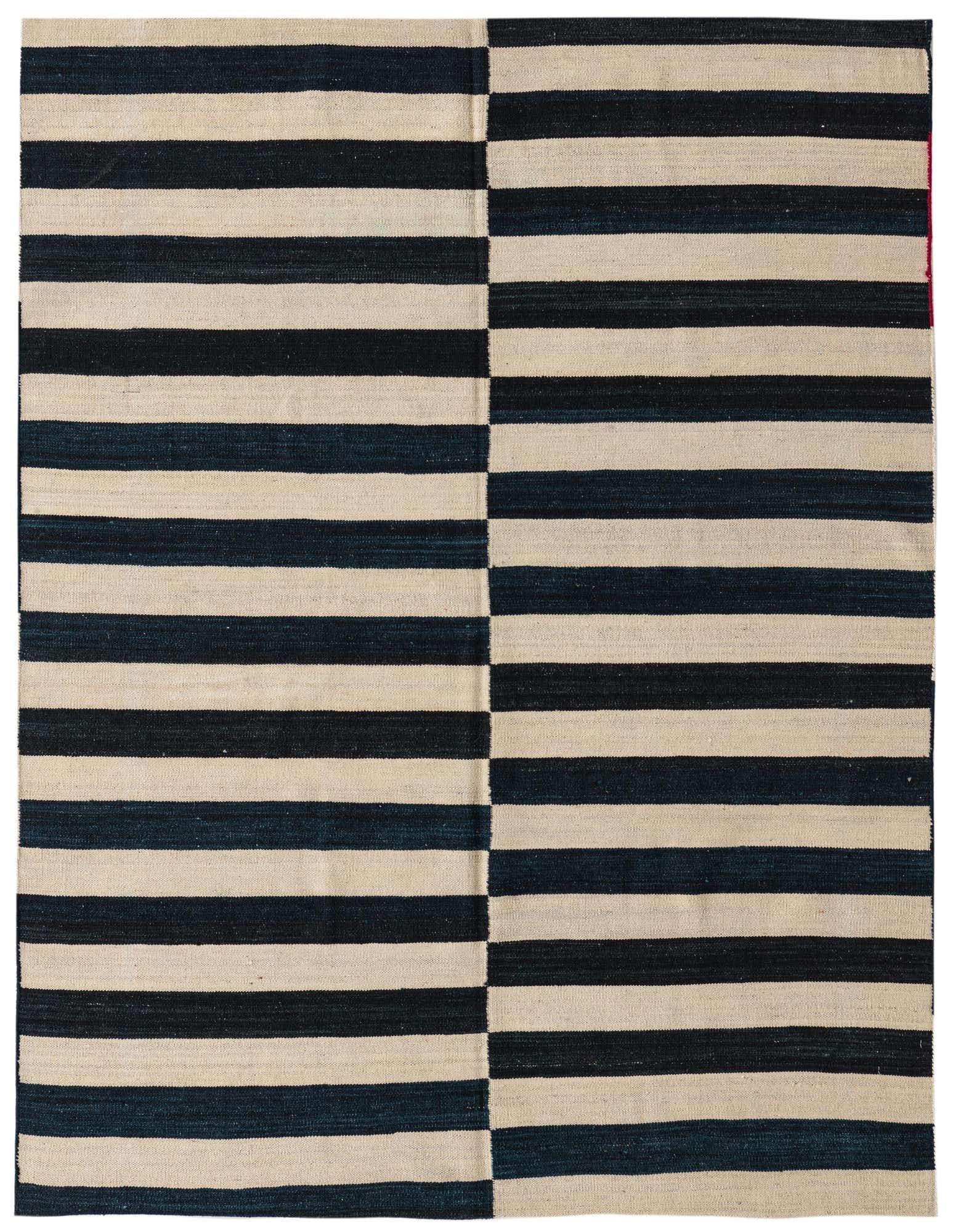 A 5' 2 x 5' 7 square flatweave wool rug featuring wide horizontal stripes in cream and black, with a vertical seam creating a staggered pattern.