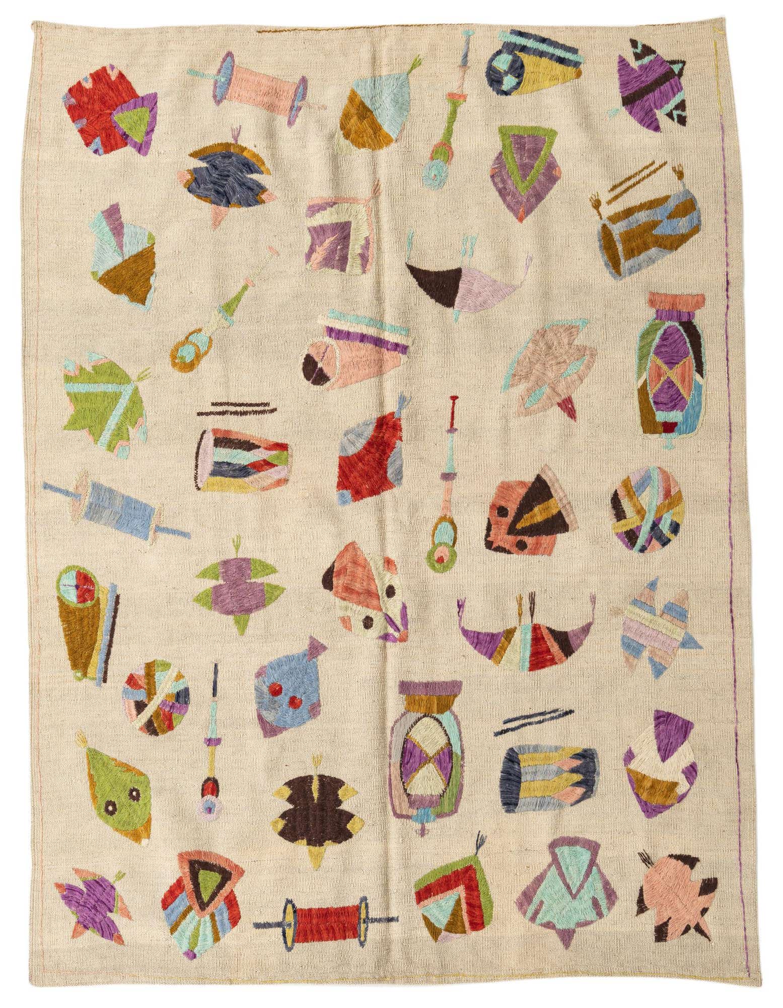 A 5'4" x 6'2" square ivory flatweave wool rug with colorful tribal and modern Suzani-style embroidered patterns.