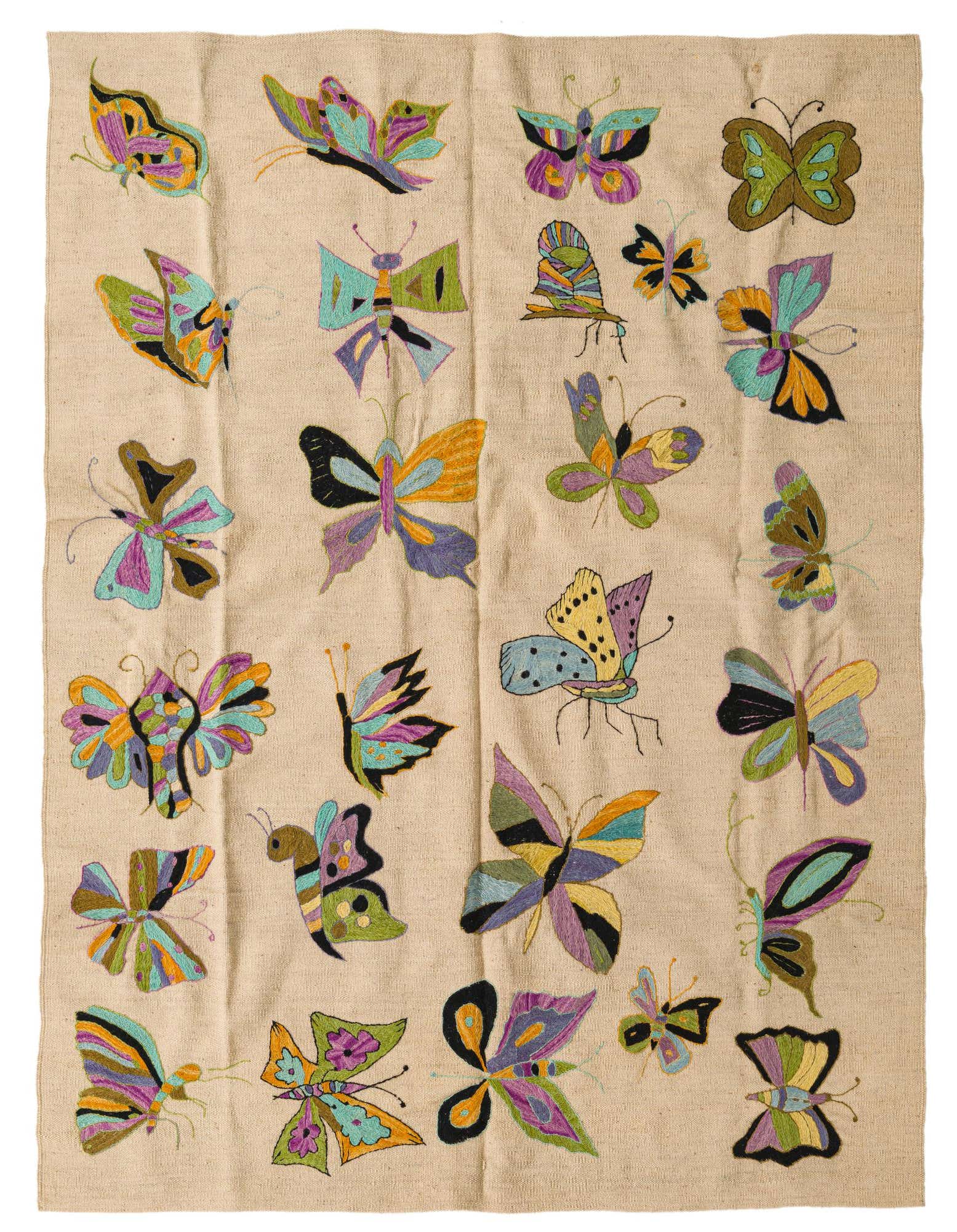 A 5' 1 x 6' 2 square ivory flatweave rug featuring numerous colorful embroidered butterfly motifs in various sizes and hues.