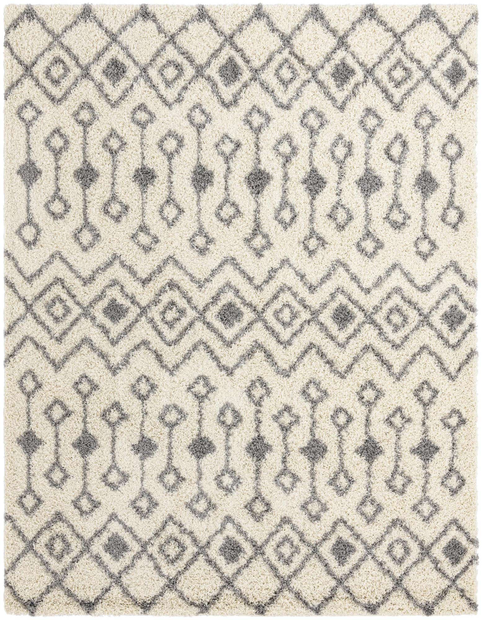 A 10' 0 x 10' 0 square ivory shag rug with a modern tribal pattern in gray, featuring diamonds and zigzag lines.