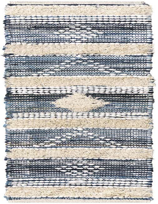 A 1' 2 x 5' 1 Cotton Chindi table runner with a tribal pattern in ivory, cream, and blue hues, featuring textured stripes and a central diamond motif.