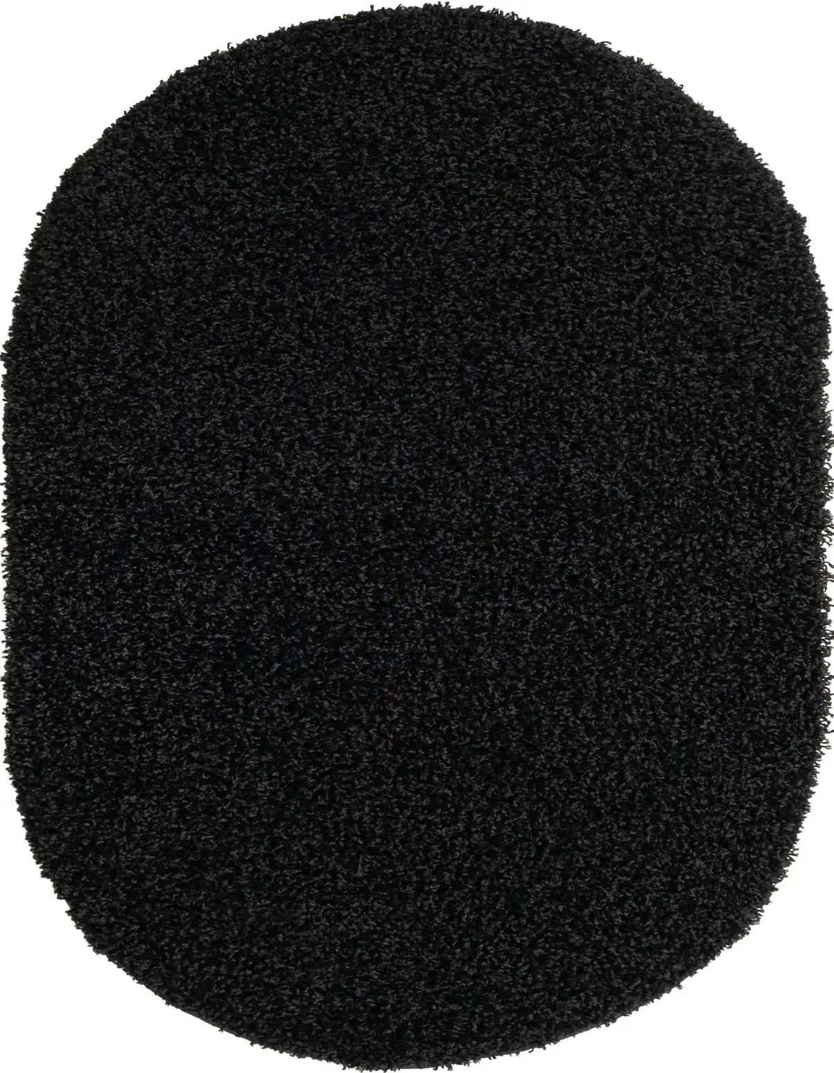 A soft, plush black oval shag rug, perfect for adding modern comfort to any indoor living space.