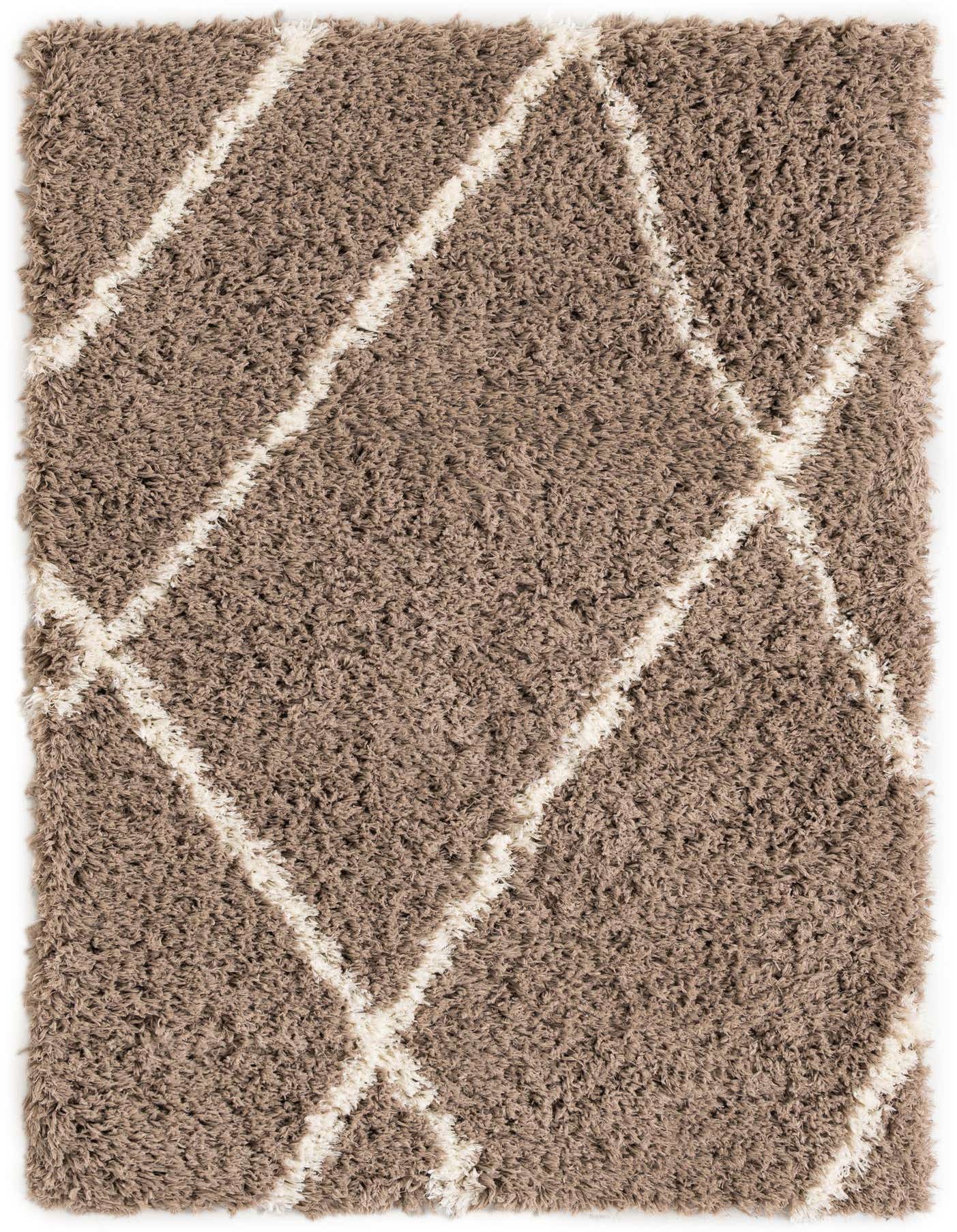 A 4x6 rectangular brown shag rug with a modern ivory diamond pattern, suitable for a living room or bedroom.