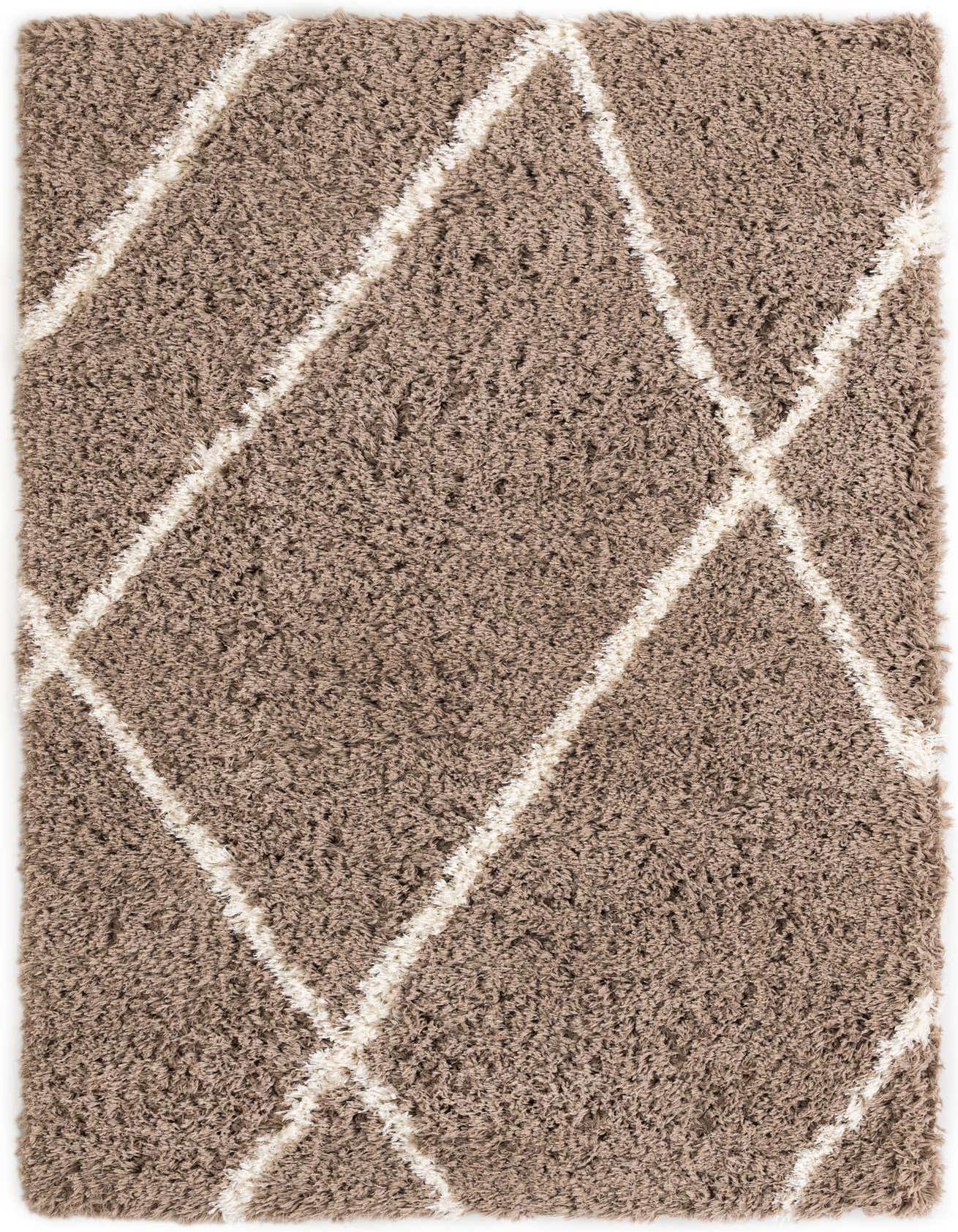 A 5x8 rectangular brown shag rug with a modern ivory diamond pattern, suitable for a living room.
