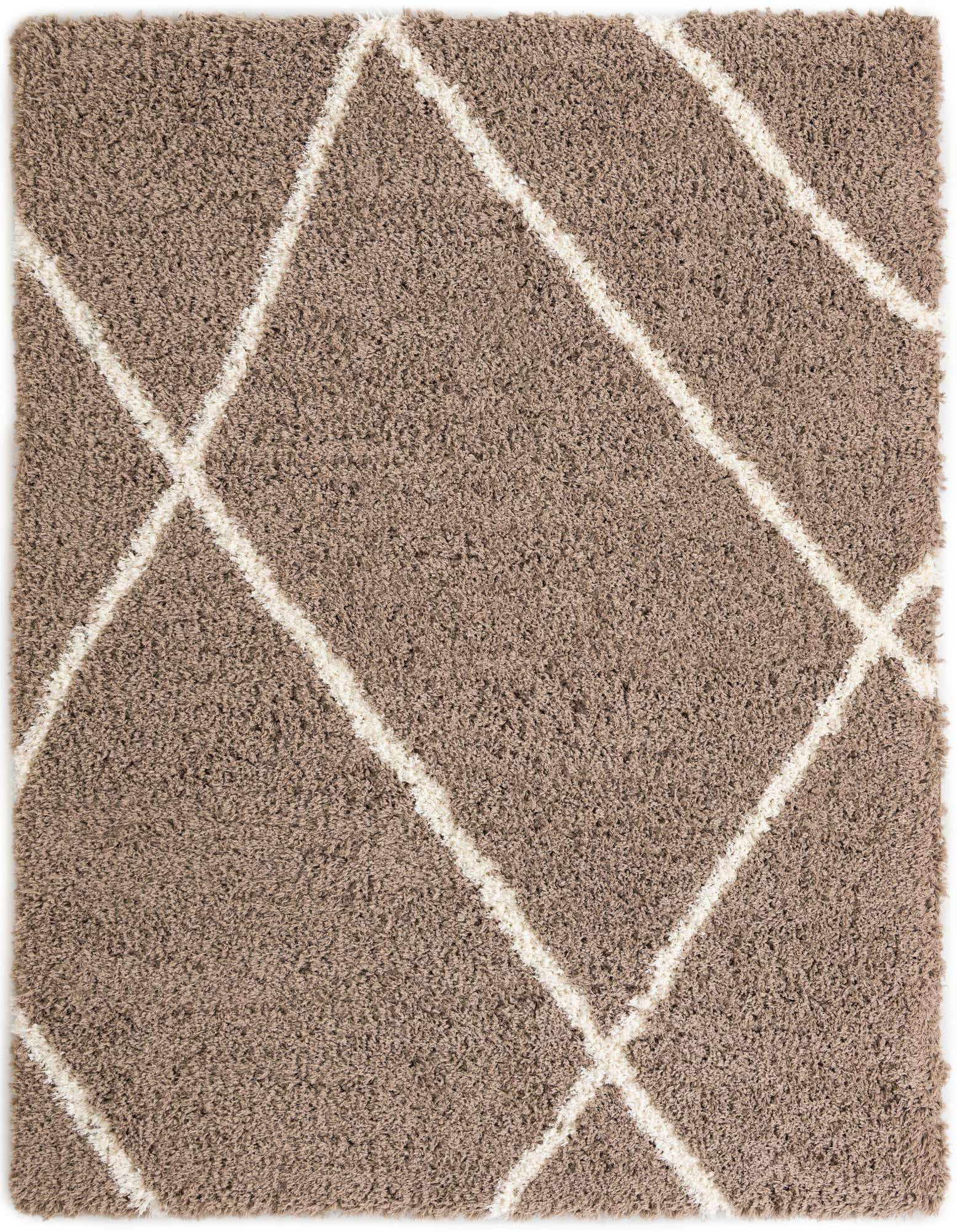 A rectangular 8x10 brown shag rug with a modern ivory geometric crisscross pattern, perfect for a living room.