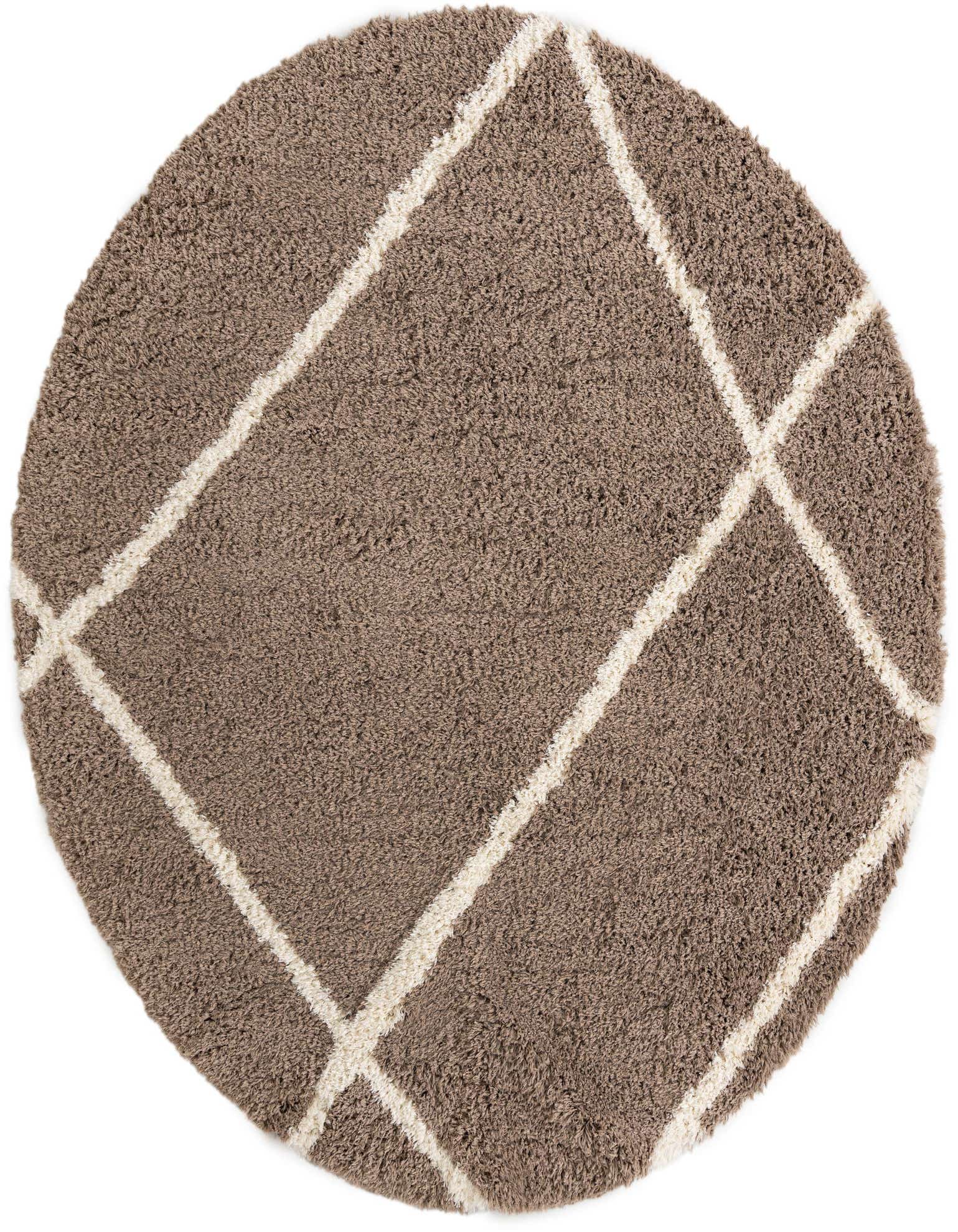 A 10-foot round brown shag rug with a modern ivory geometric crisscross pattern, ideal for a living room or bedroom.