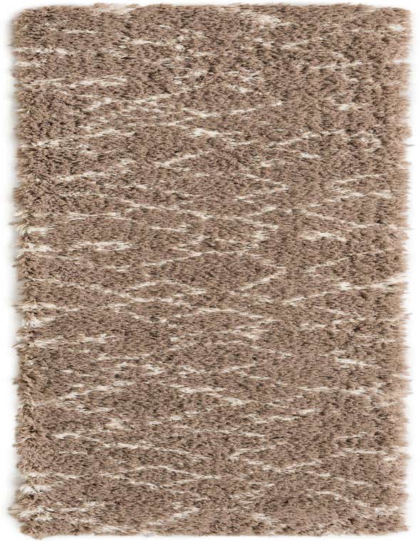 A 10 ft runner rug from the Infinity Shag collection, featuring a modern brown and ivory geometric pattern with a plush shag pile.