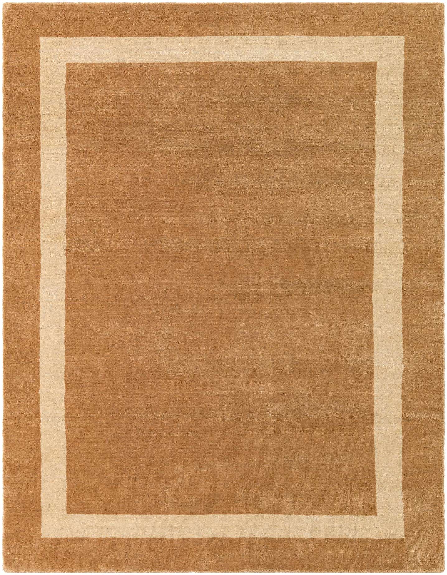 A 4x6 rectangular Jill Zarin Border Wool rug in warm brown with a contrasting ivory border, suitable for various indoor rooms.