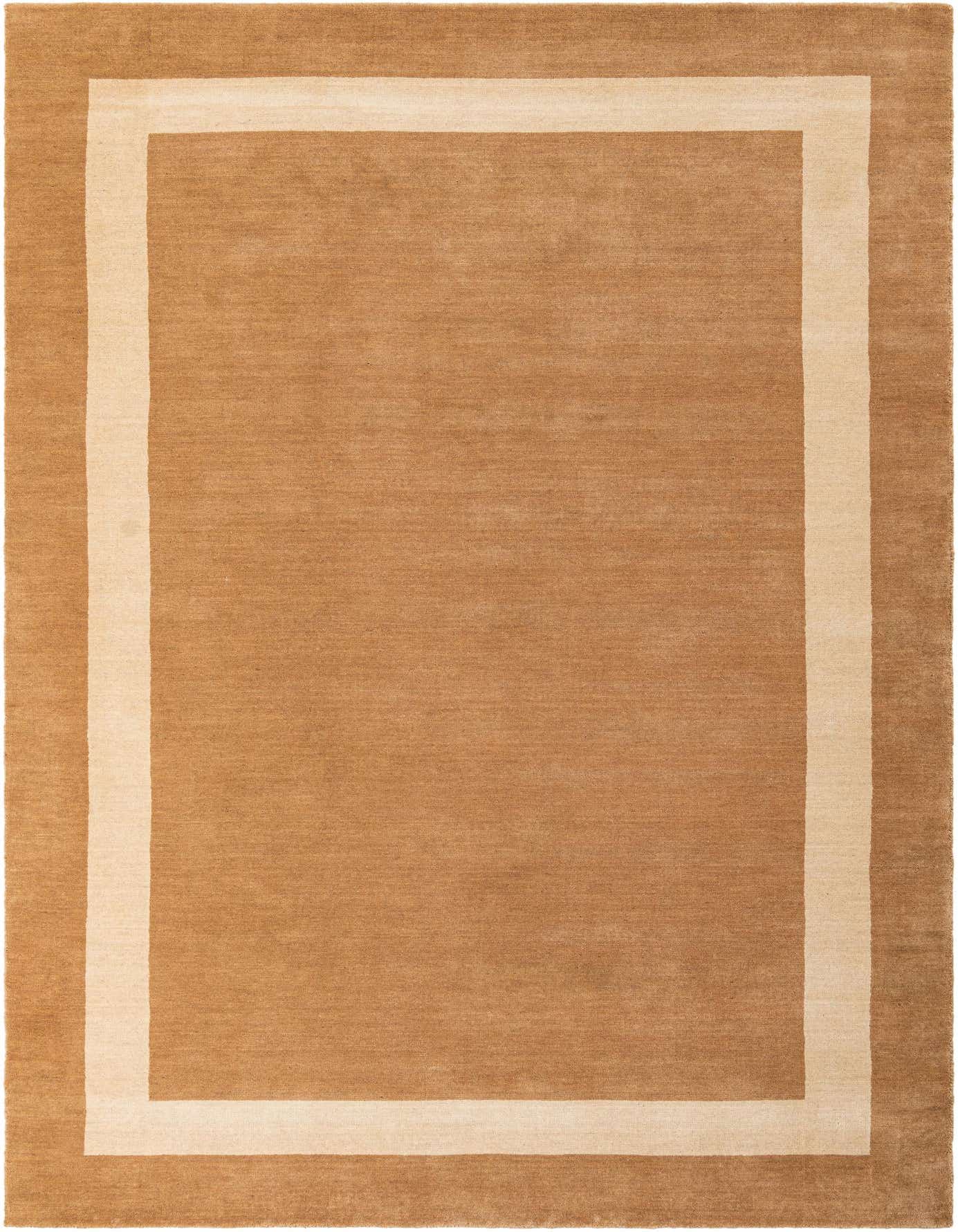 A 6x9 rectangular Jill Zarin Border Wool rug featuring a solid brown field with a cream border, perfect for a living room.