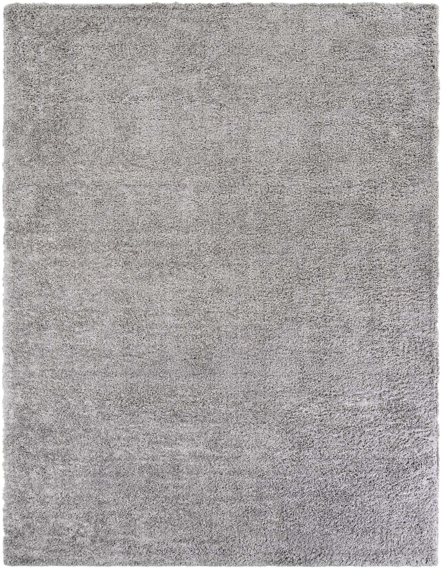 A large 10x13 light grey rectangular shag rug with a soft, textured pile, suitable for a modern living room or bedroom.