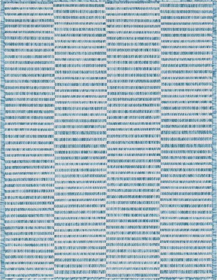 A light aqua and white Scandinavian runner rug with a modern striped pattern, ideal for hallways or patios.