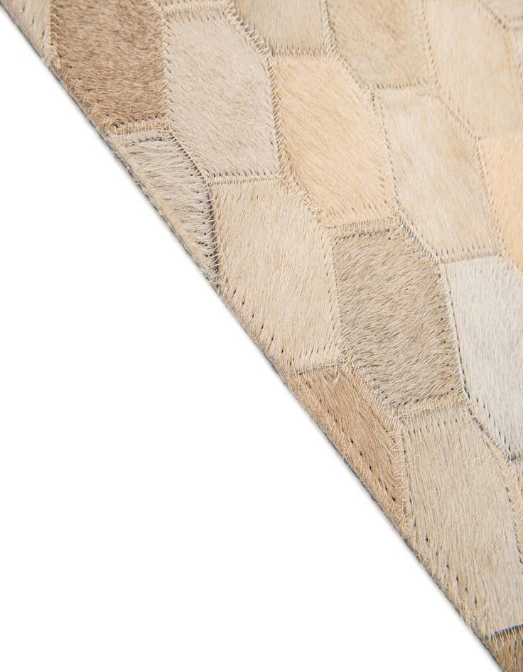 Detail image of  3' 11 x 6' Cowhide Stocks Rug