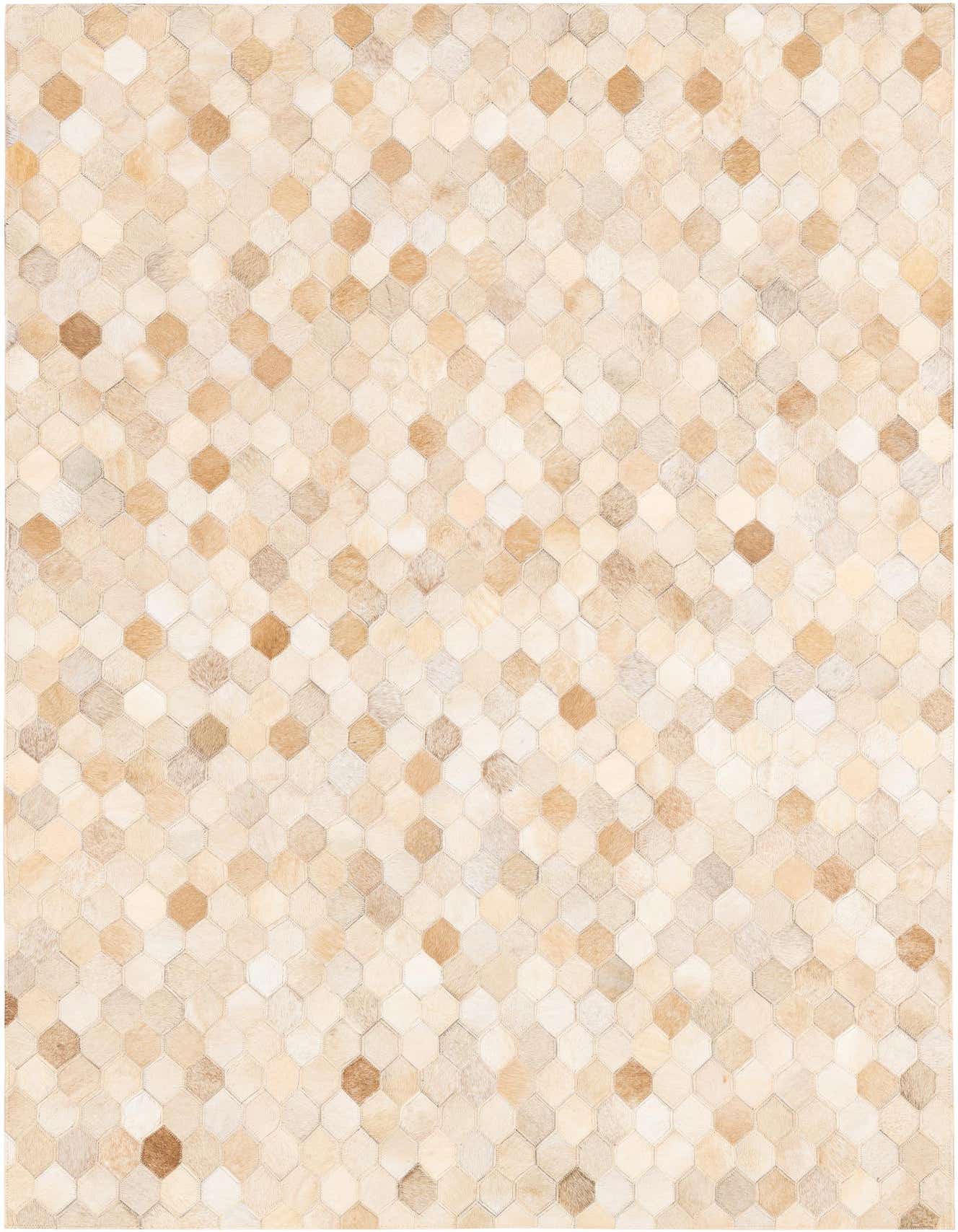 A 4x6 rectangular modern rug made from natural cowhide and leather in varying shades of ivory and cream, featuring a geometric honeycomb pattern.