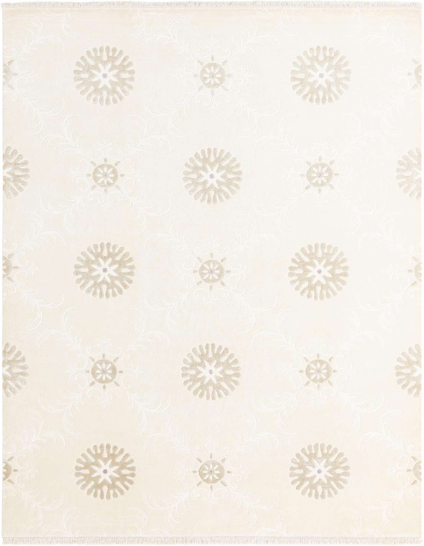 A 7x10 rectangular ivory wool rug with a modern pattern of scattered beige circular motifs and subtle cream scrollwork.