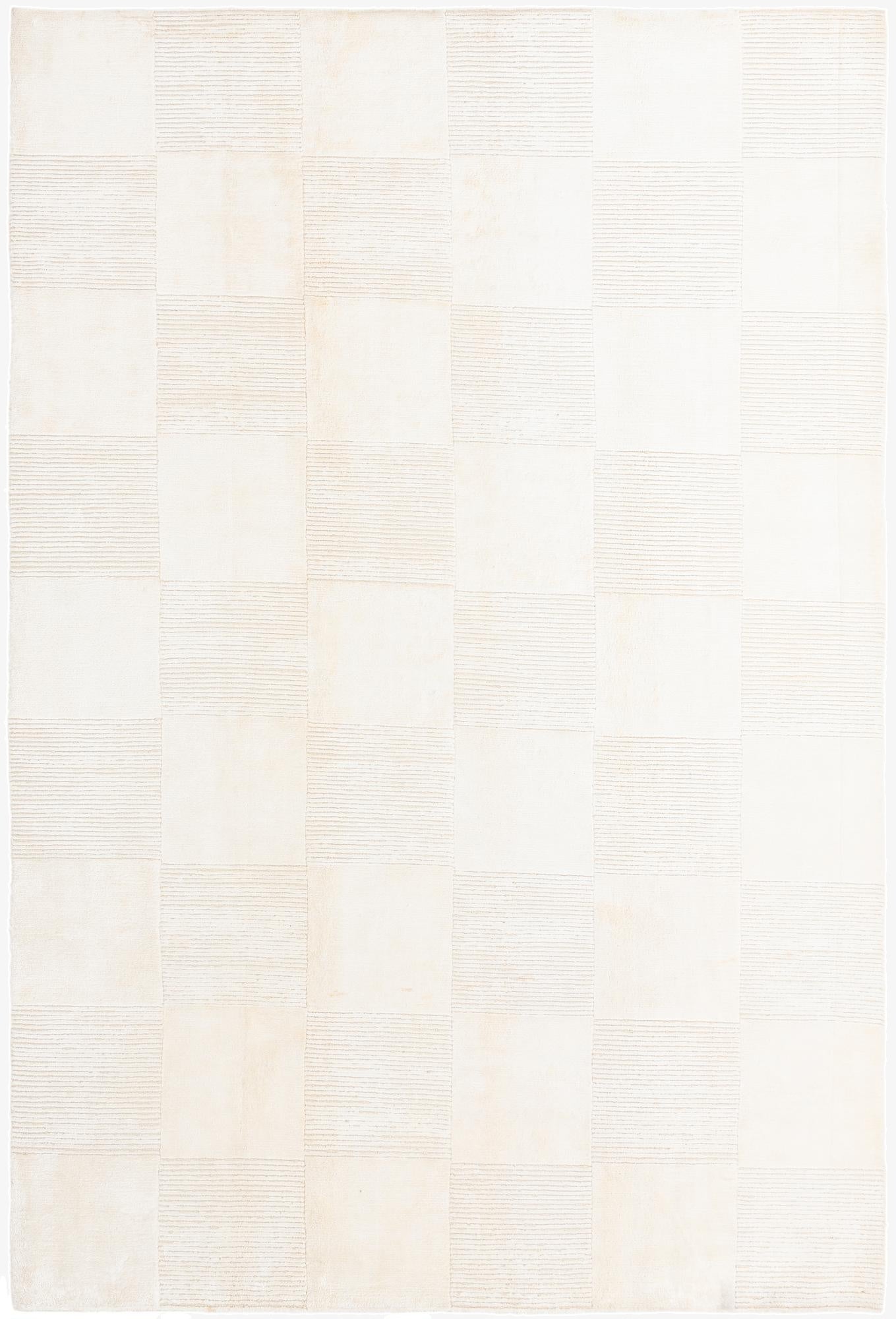 A 7x10 rectangular Darya rug in ivory and cream, featuring a modern checkerboard pattern with alternating textured and smooth wool squares.