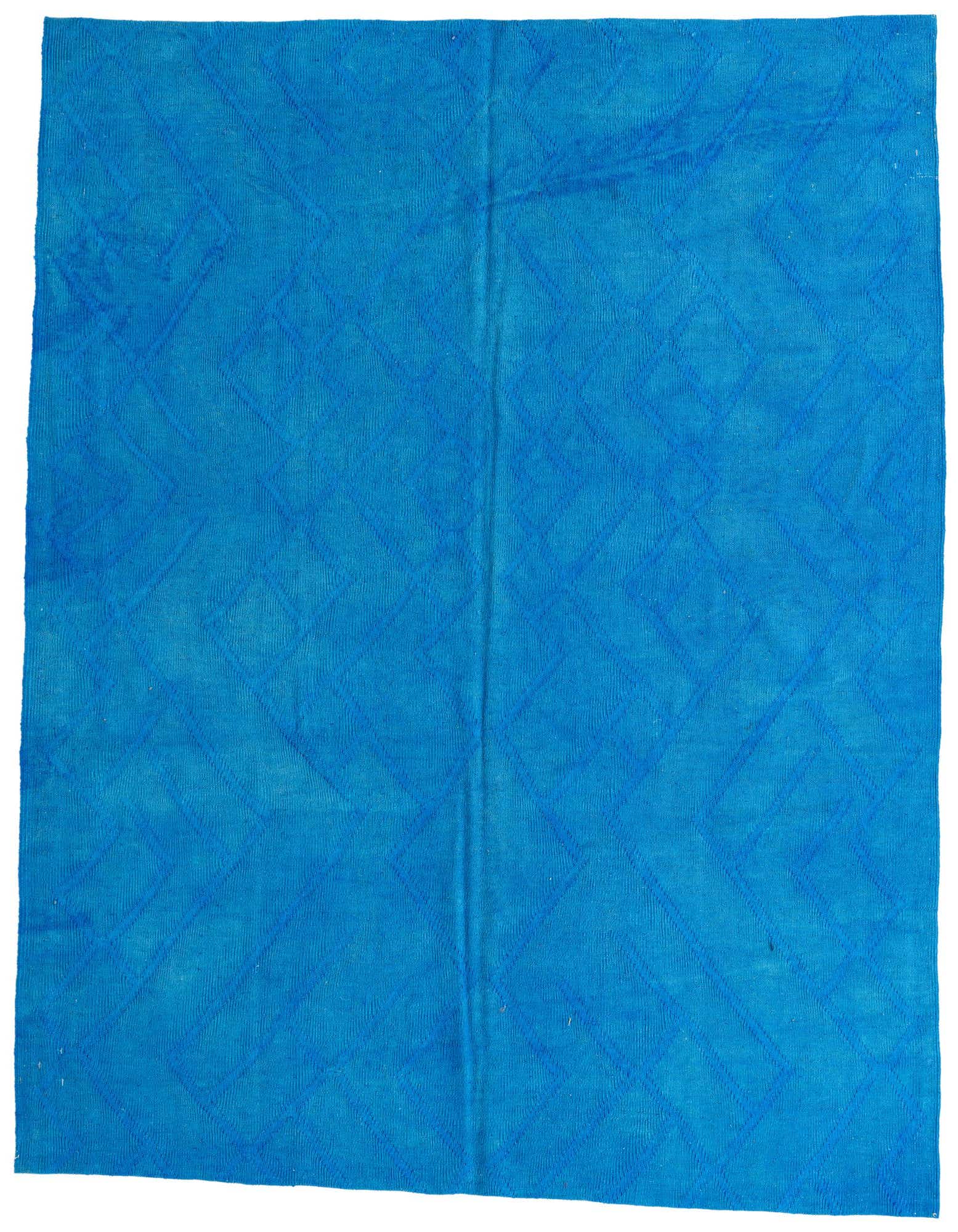 A 6x9 rectangular Kilim Modern rug from Rugs.com, featuring a flatweave tribal pattern in various shades of blue.