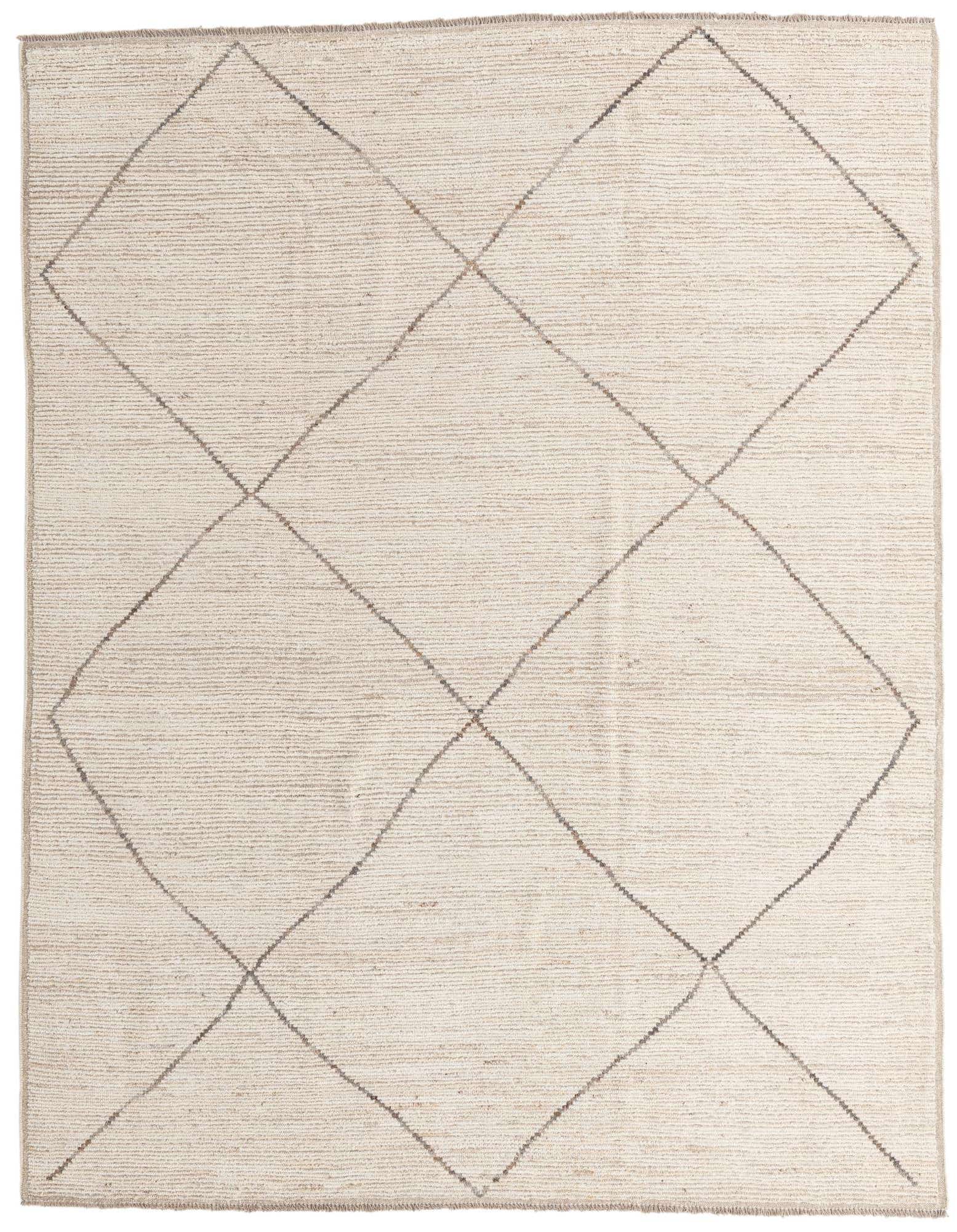 An 8x10 rectangular ivory wool shag rug with a subtle tribal diamond pattern, perfect for a modern living room.