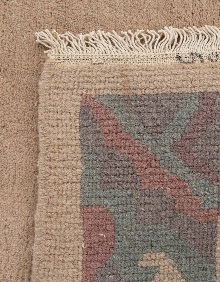 Detail image of  3' 11 x 5' 10  Hand Knotted Nepal Wool Rug