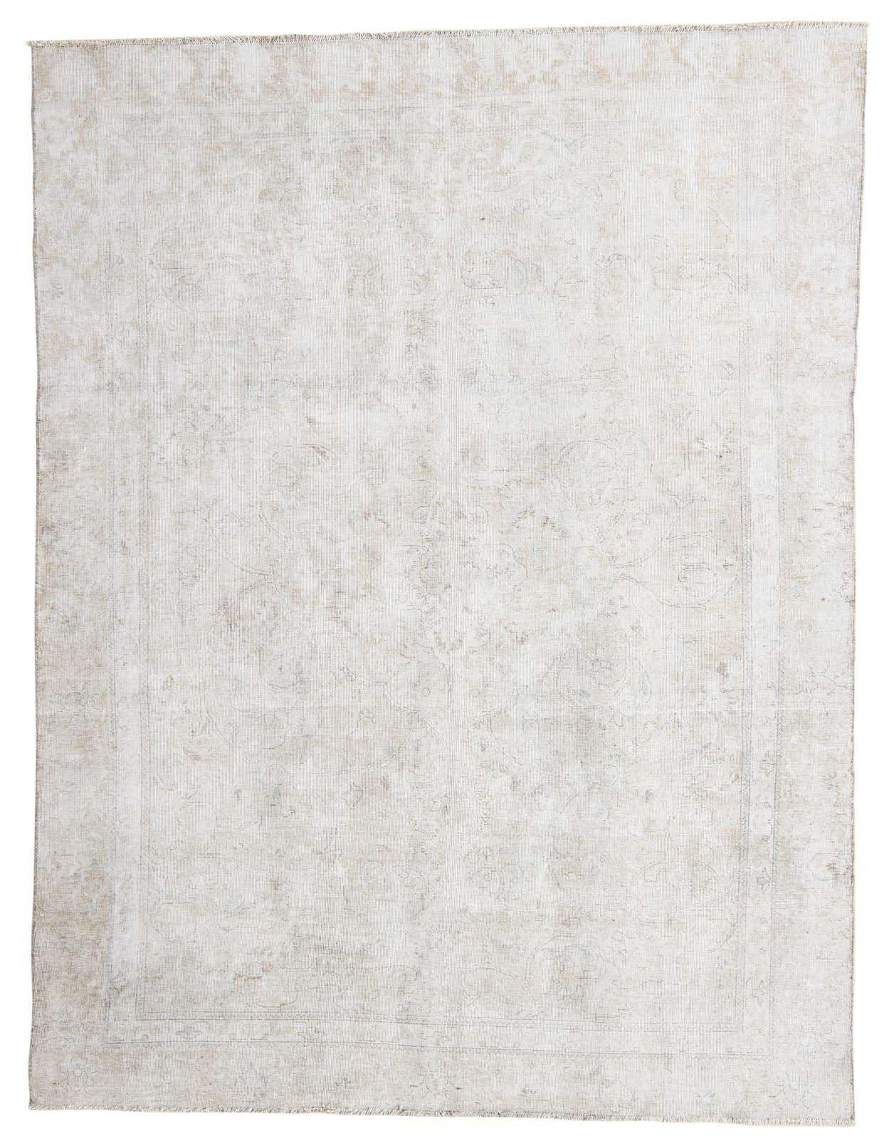 A 6x9 rectangular ivory and cream Persian-style wool rug with a subtle medallion pattern, suitable for a living room.