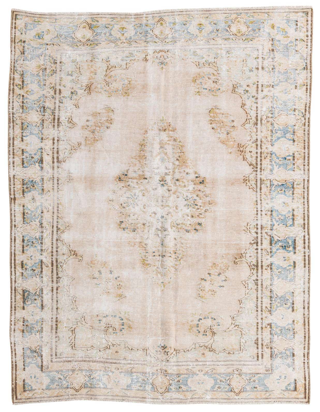 A 6x9 rectangular ivory and cream Persian-style rug with a faded medallion pattern and light blue border.