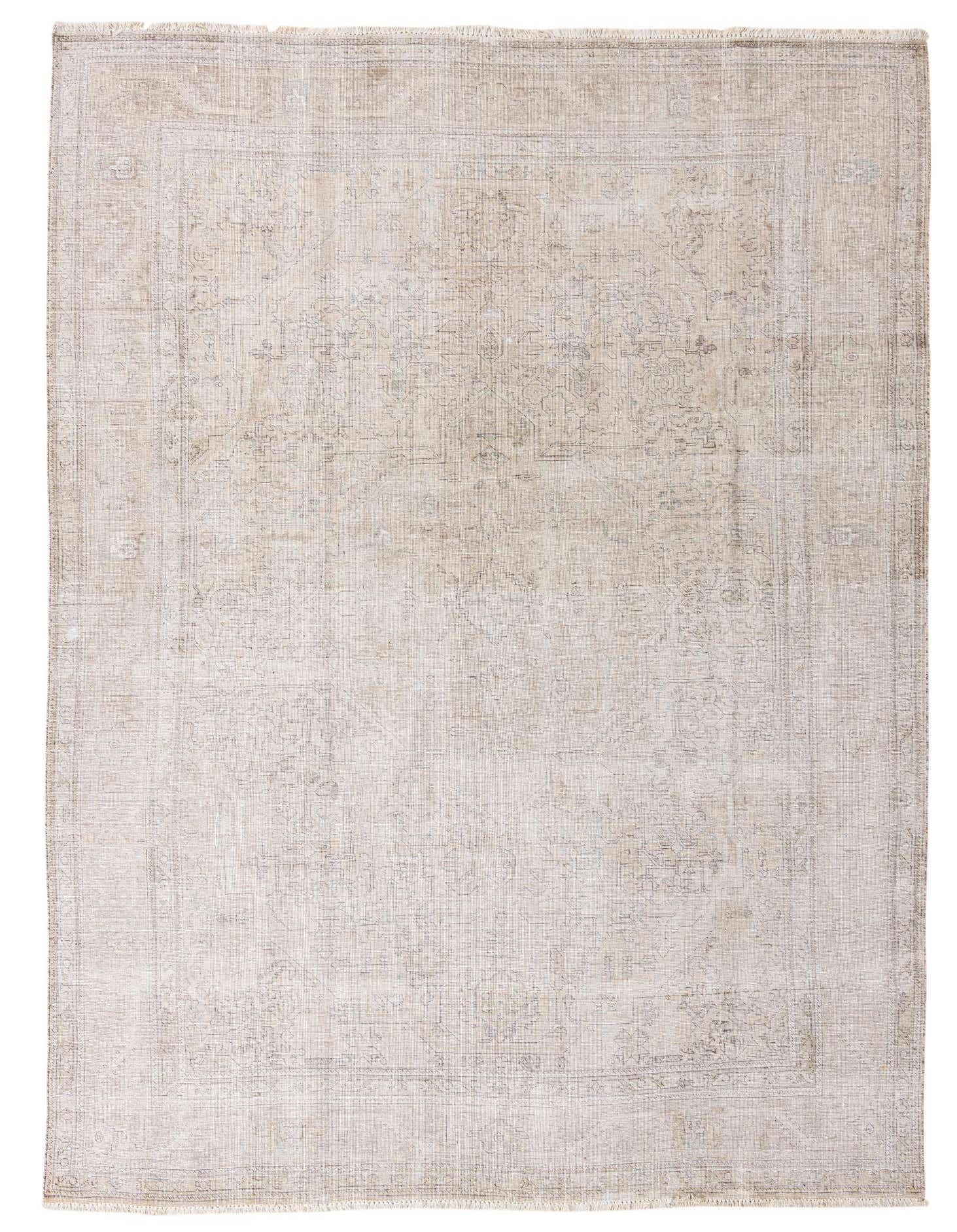 An 8x11 rectangular ivory wool rug with a subtle, faded Persian pattern, suitable for a living room.
