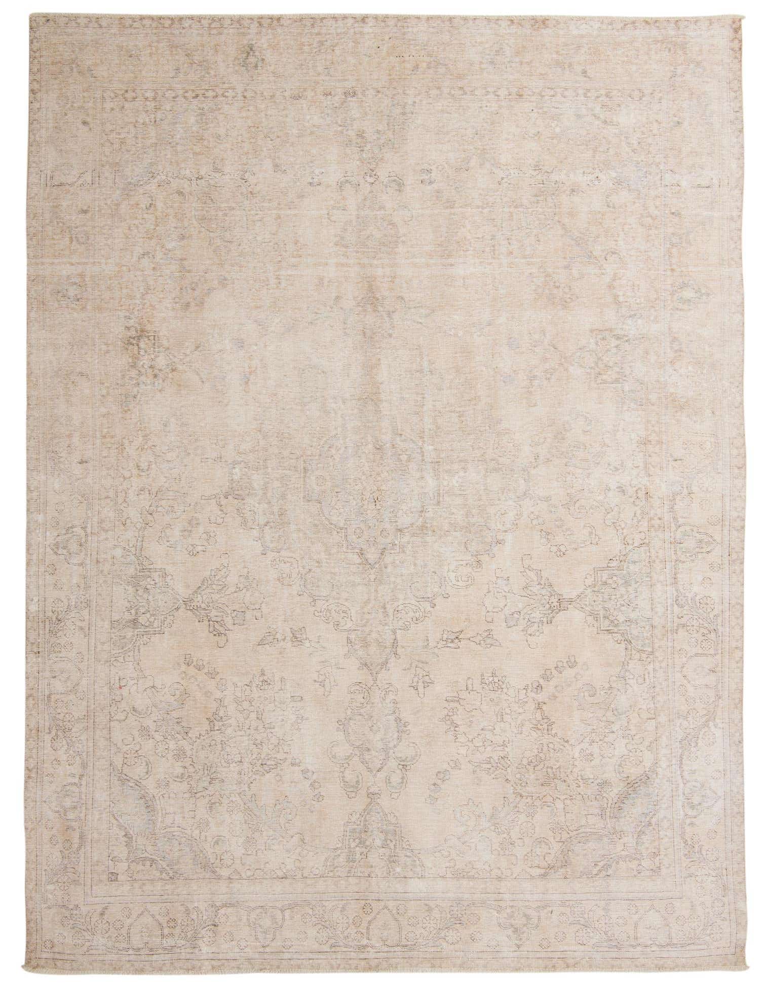 A large 9x12 rectangular ivory and cream Persian-style wool rug with a subtle floral pattern and vintage distressed look.