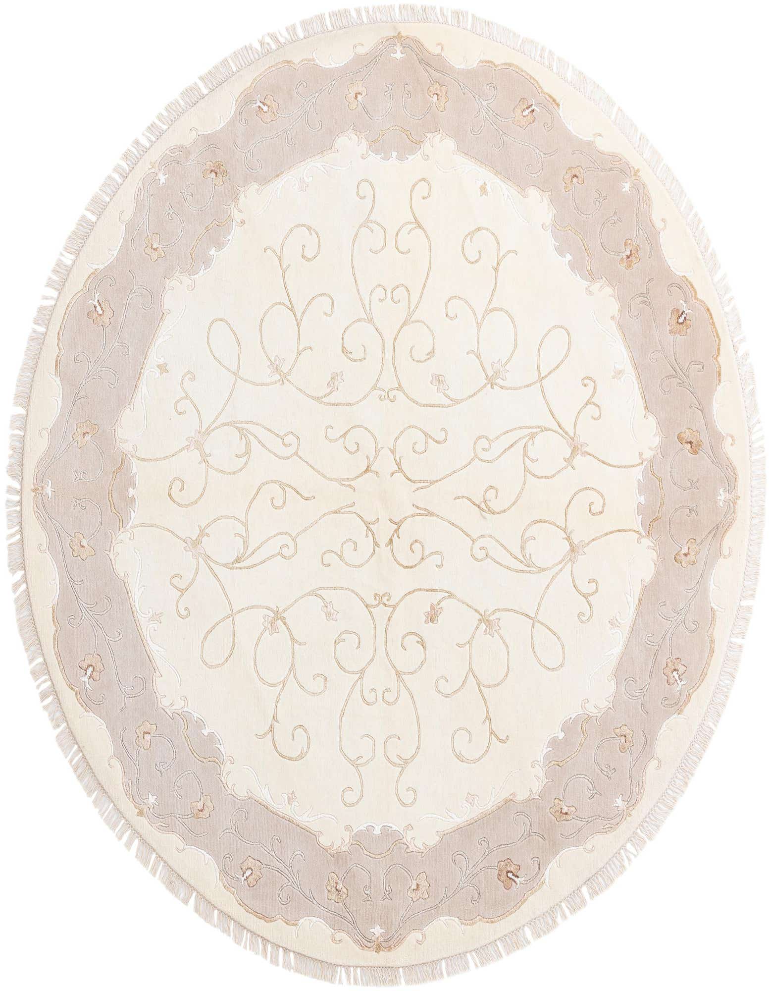 A round ivory wool rug with a light taupe border and delicate floral and vine patterns, featuring fringe.