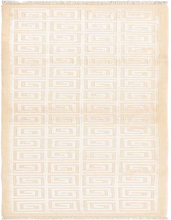 A 10 ft Darya runner rug in ivory and cream, featuring a repeating modern geometric spiral pattern, ideal for a hallway.