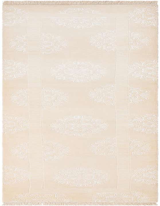 A 10 ft Darya runner rug in ivory wool, featuring a modern oriental pattern with medallions and stripes, perfect for a hallway.