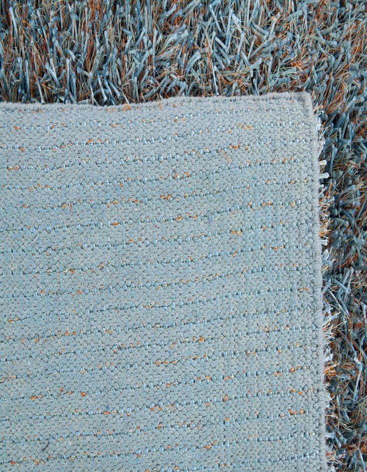 Detail image of  5' x 6' 7  Hand Woven Two-Tone Shag Rug