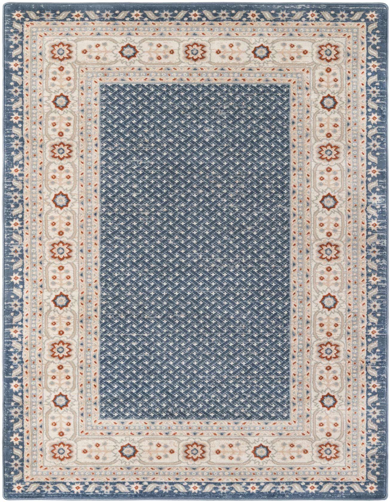 A 5x8 rectangular Charlotte rug in shades of blue with a cream border featuring modern floral motifs, suitable for a living room.