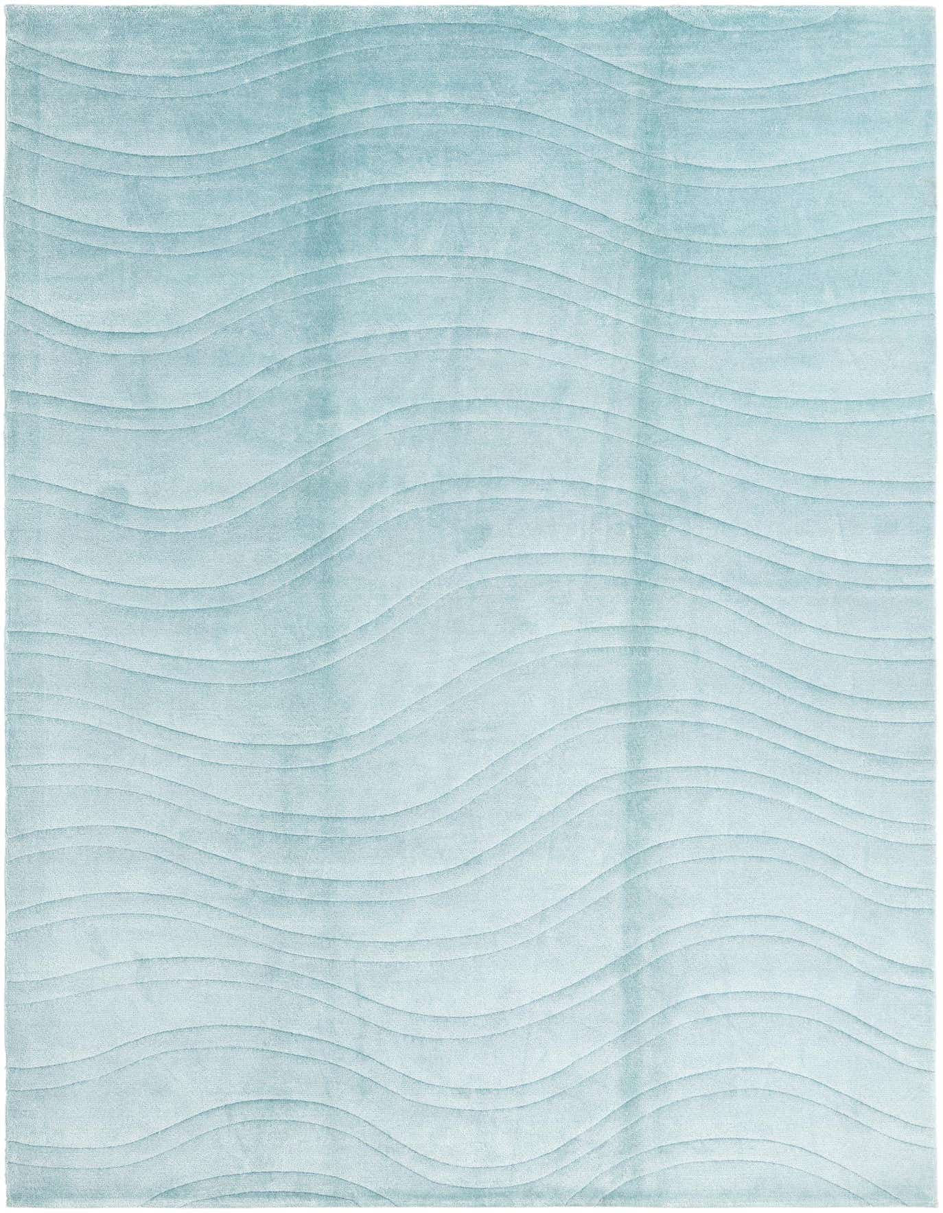 A 7x10 rectangular light blue wool rug with a modern wavy pattern, suitable for a living room or bedroom.