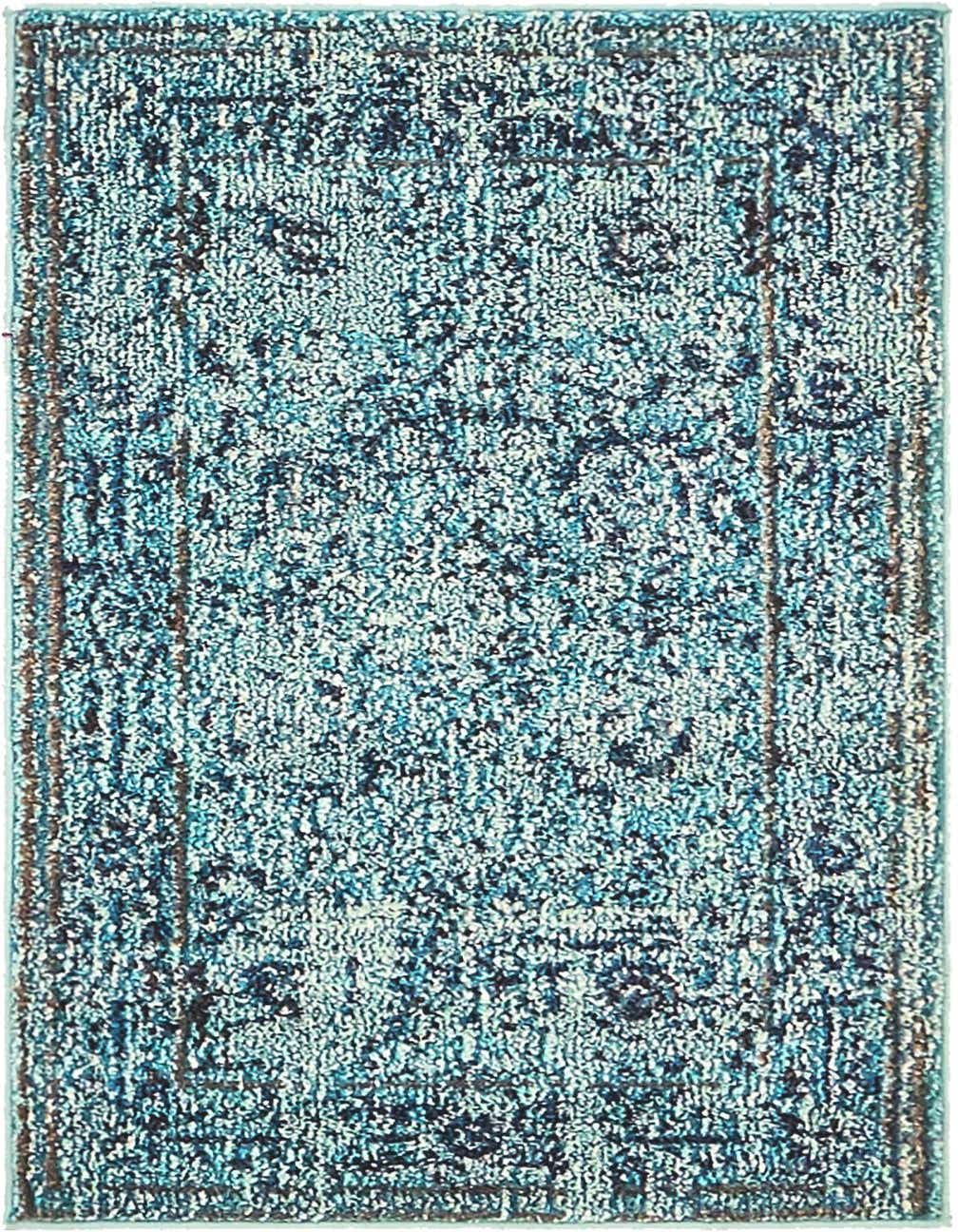 A 2x3 rectangular light blue and dark blue bohemian floral rug with a distressed look, suitable for a kitchen or entryway.