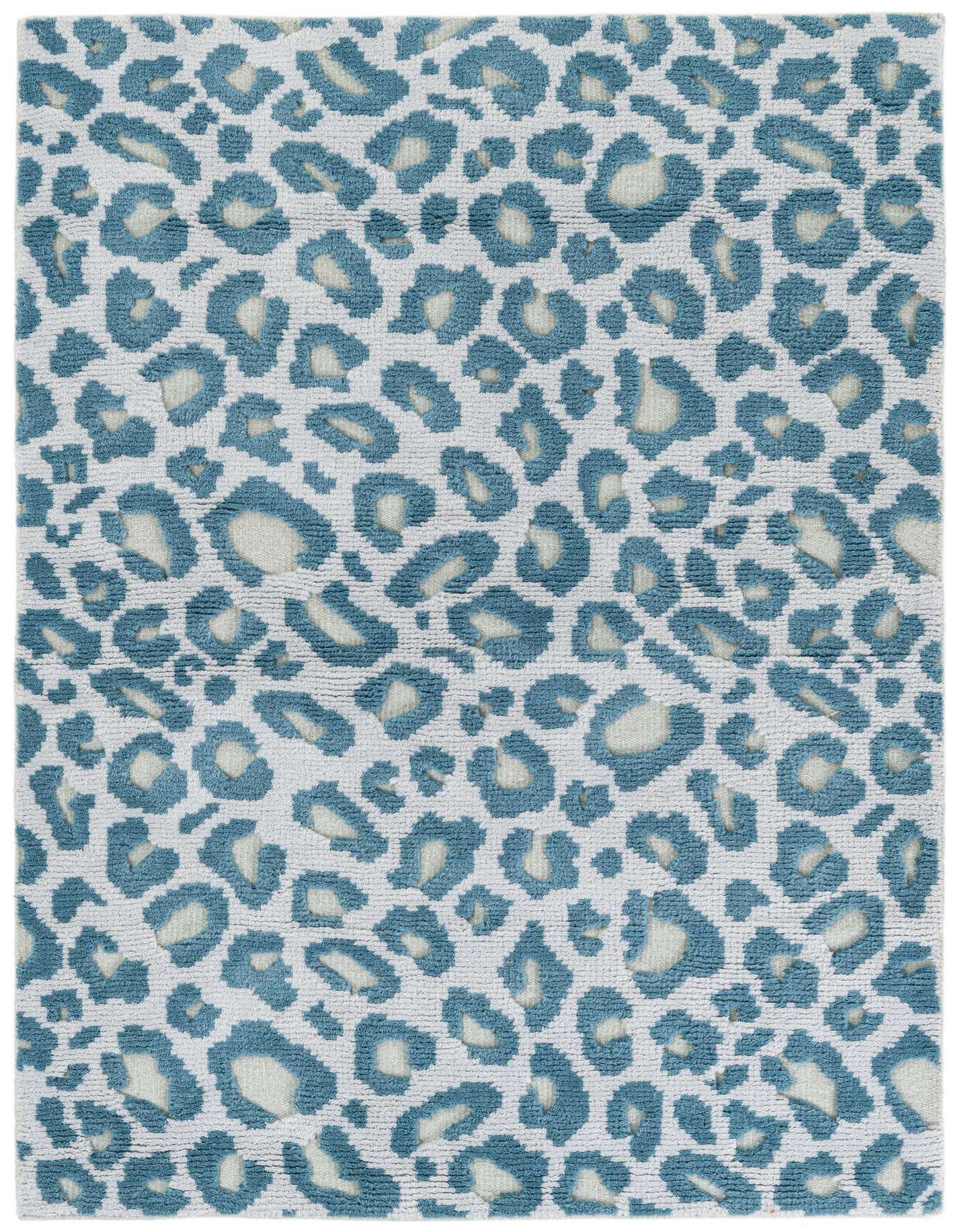 A 4x6 rectangular light blue and off-white modern area rug with an abstract leopard print pattern.