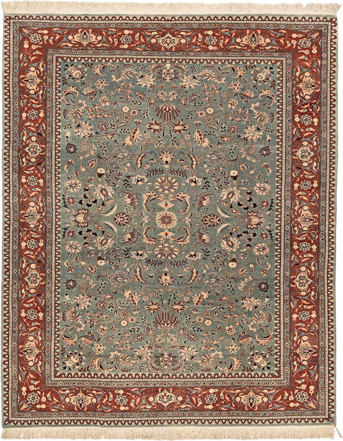 A 6x9 rectangular Kashan rug in light blue with a detailed traditional floral pattern and a rust-colored border.