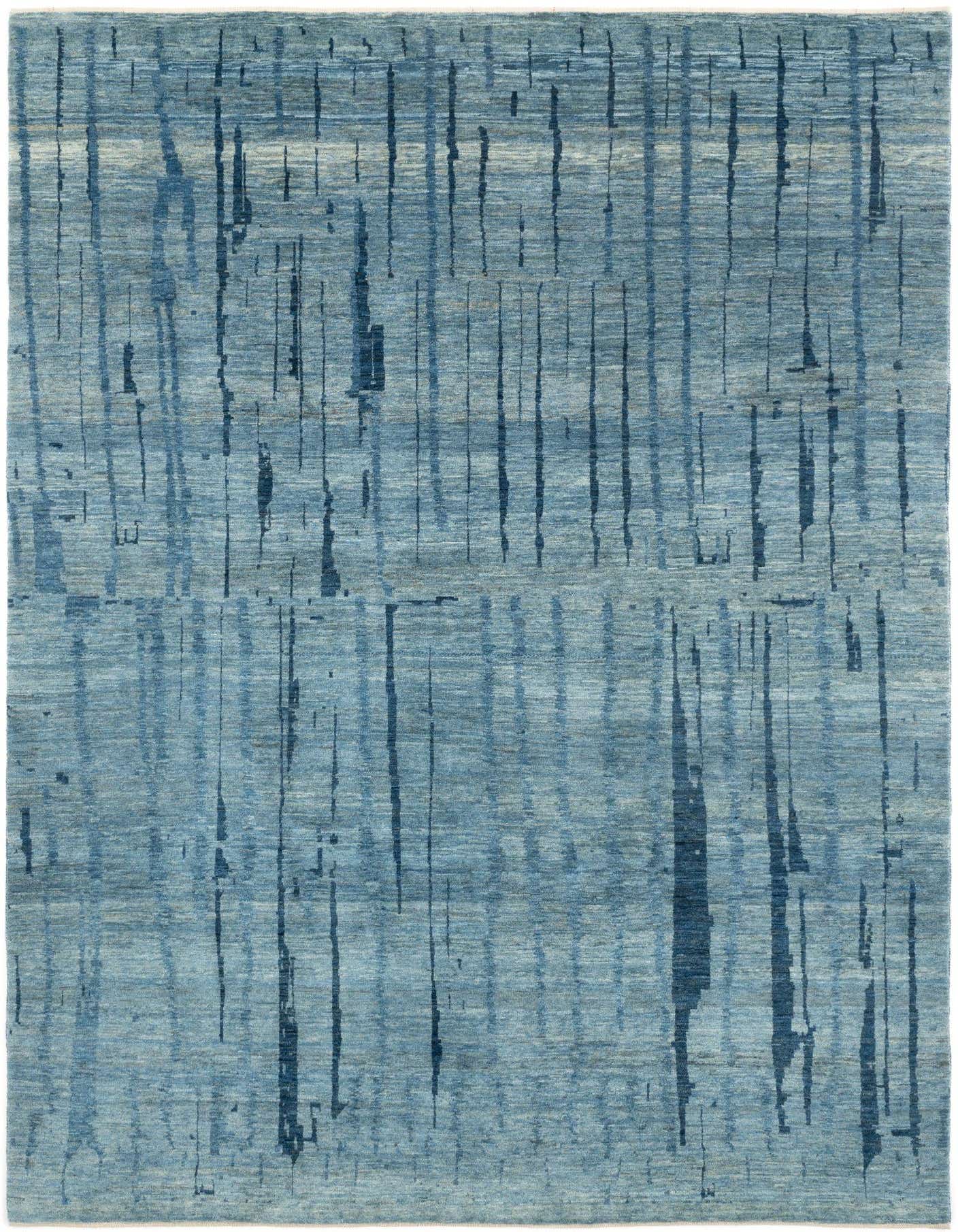 A 6x9 rectangular light blue Persian wool rug with a subtle, distressed vertical stripe pattern, suitable for a living room.