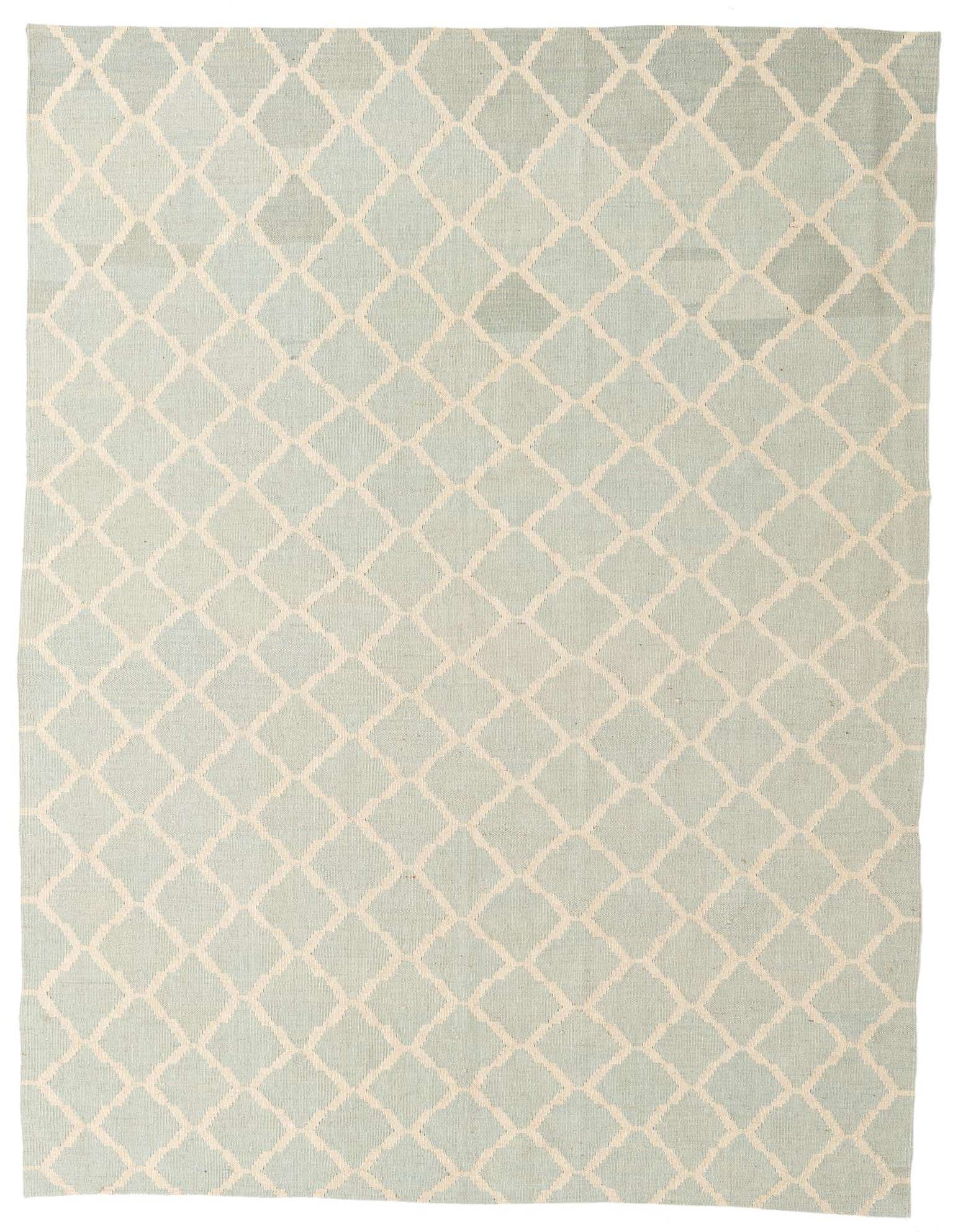 A 6x9 rectangular light blue and cream flatweave wool rug with a modern tribal diamond pattern.