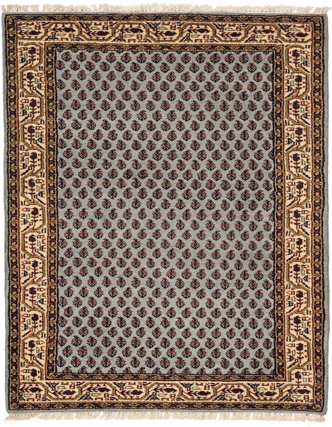 A 3x5 rectangular light blue traditional wool rug with a repeating floral pattern and ornate border.
