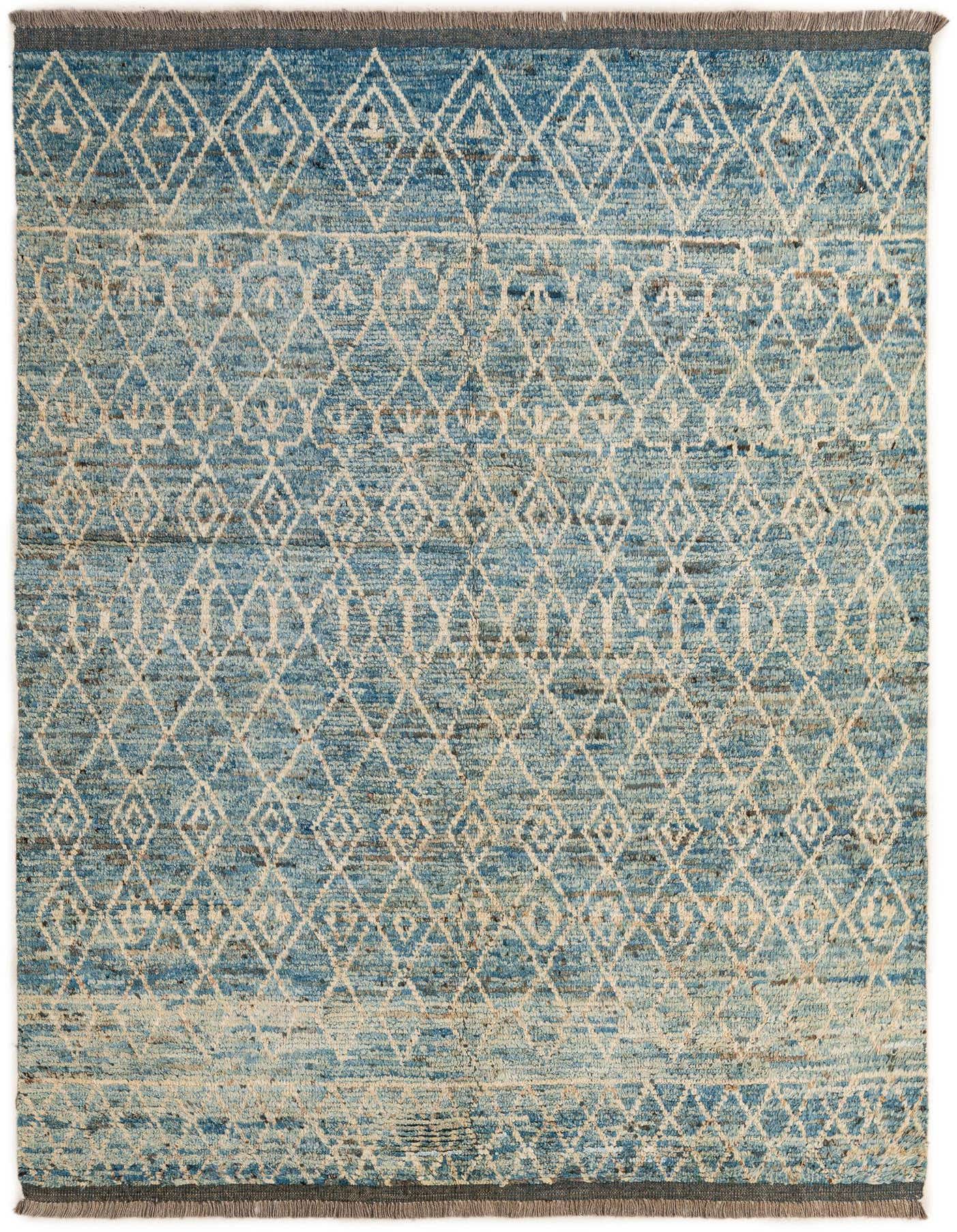 A 5x8 rectangular light blue wool rug with an off-white tribal diamond pattern and fringed edges.