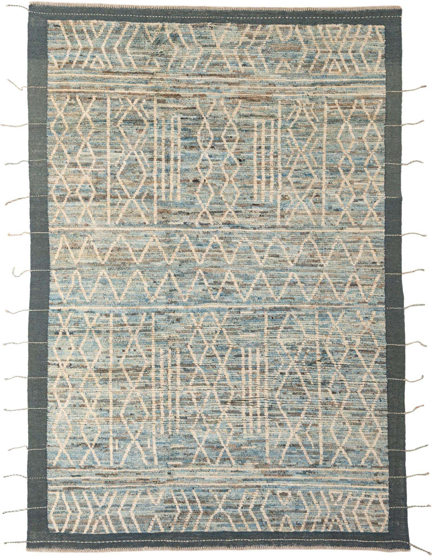 A 6x9 rectangular Moroccan rug featuring a light blue and cream tribal pattern with a dark blue border and fringe.