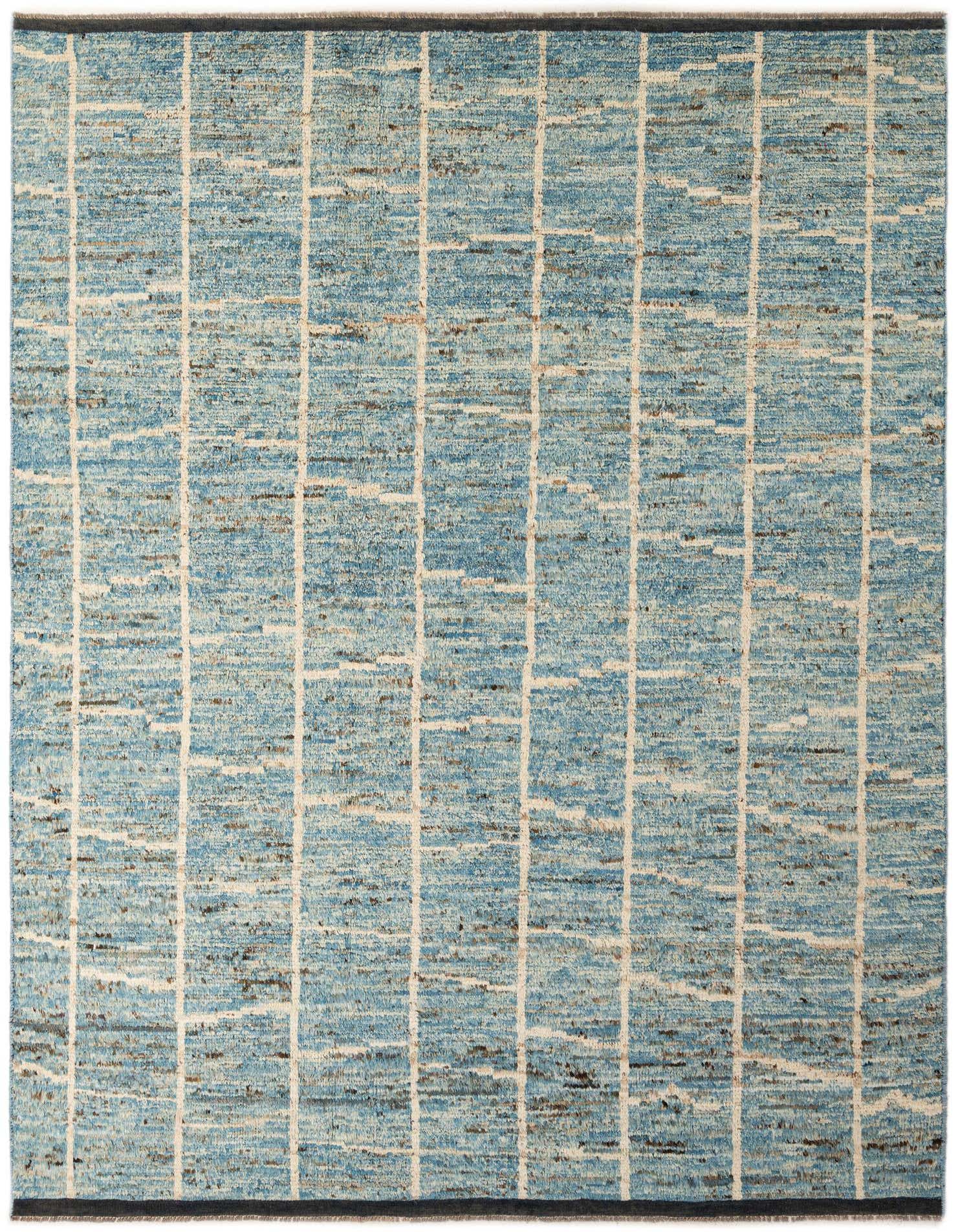 A 7x10 rectangular light blue wool rug with an abstract tribal grid pattern, ideal for a living room.