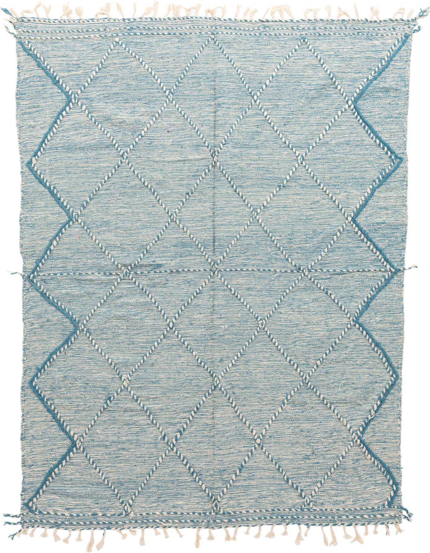 A light blue 7x10 rectangular wool shag rug with a white and dark blue tribal diamond pattern and white tassels.