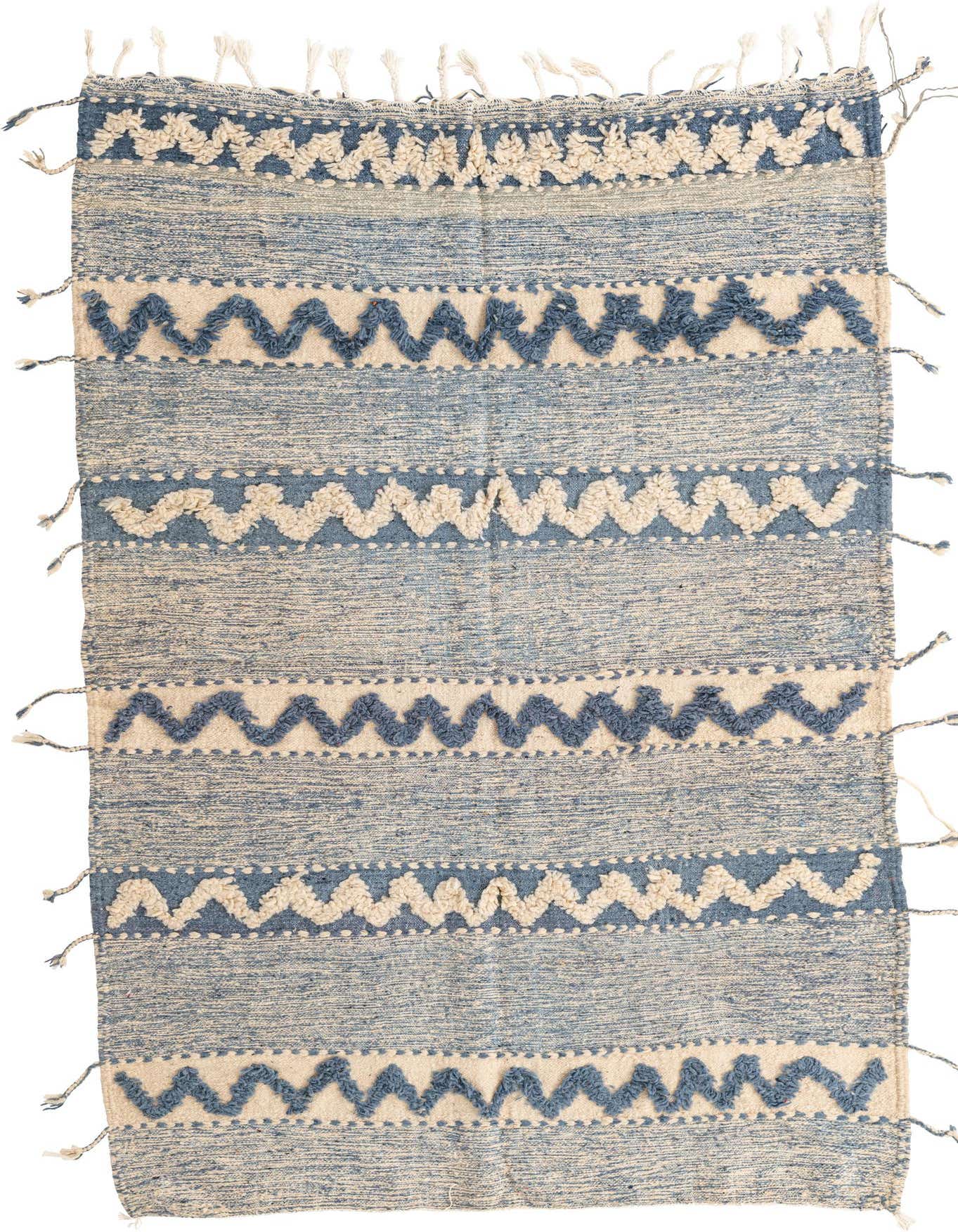 A 5x8 rectangular light blue and cream wool rug with a tribal zigzag pattern and decorative tassels.
