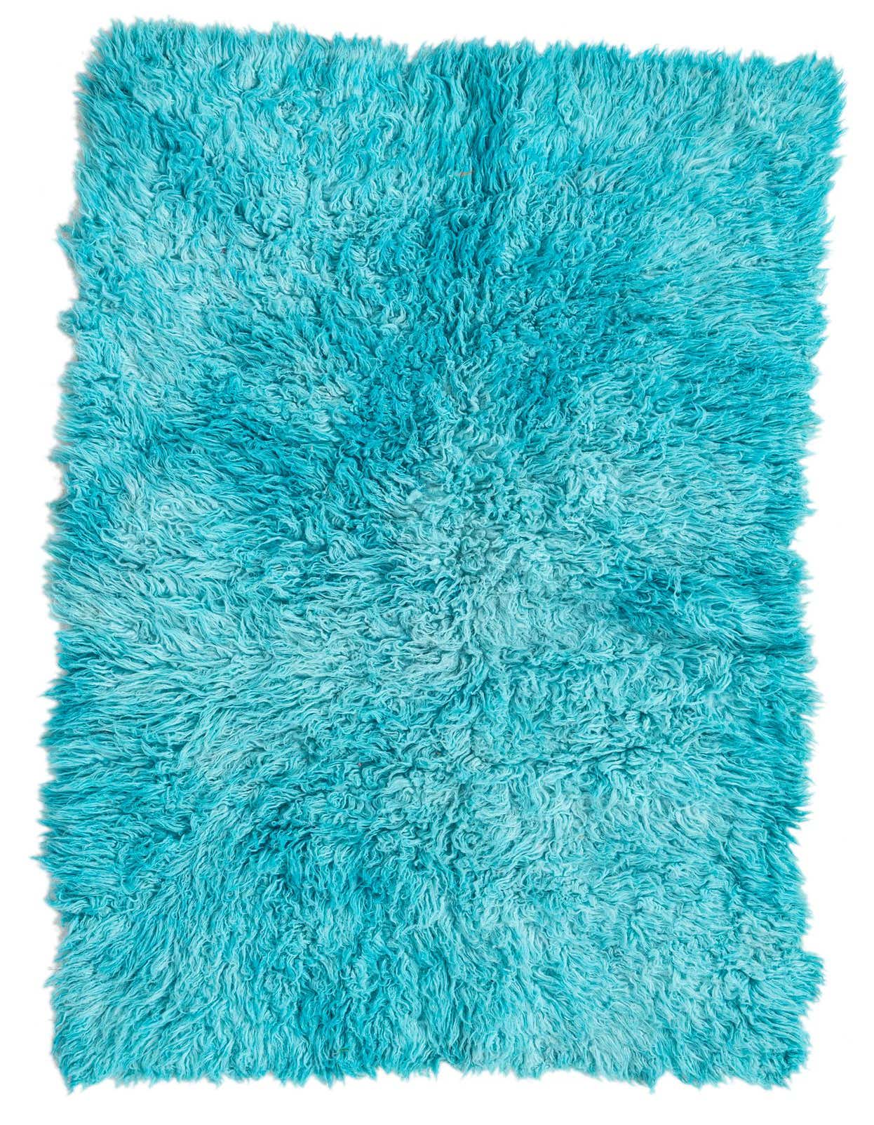 A rectangular 3x5 light blue shag rug with a plush, textured pile, perfect for adding comfort to a living room or bedroom.
