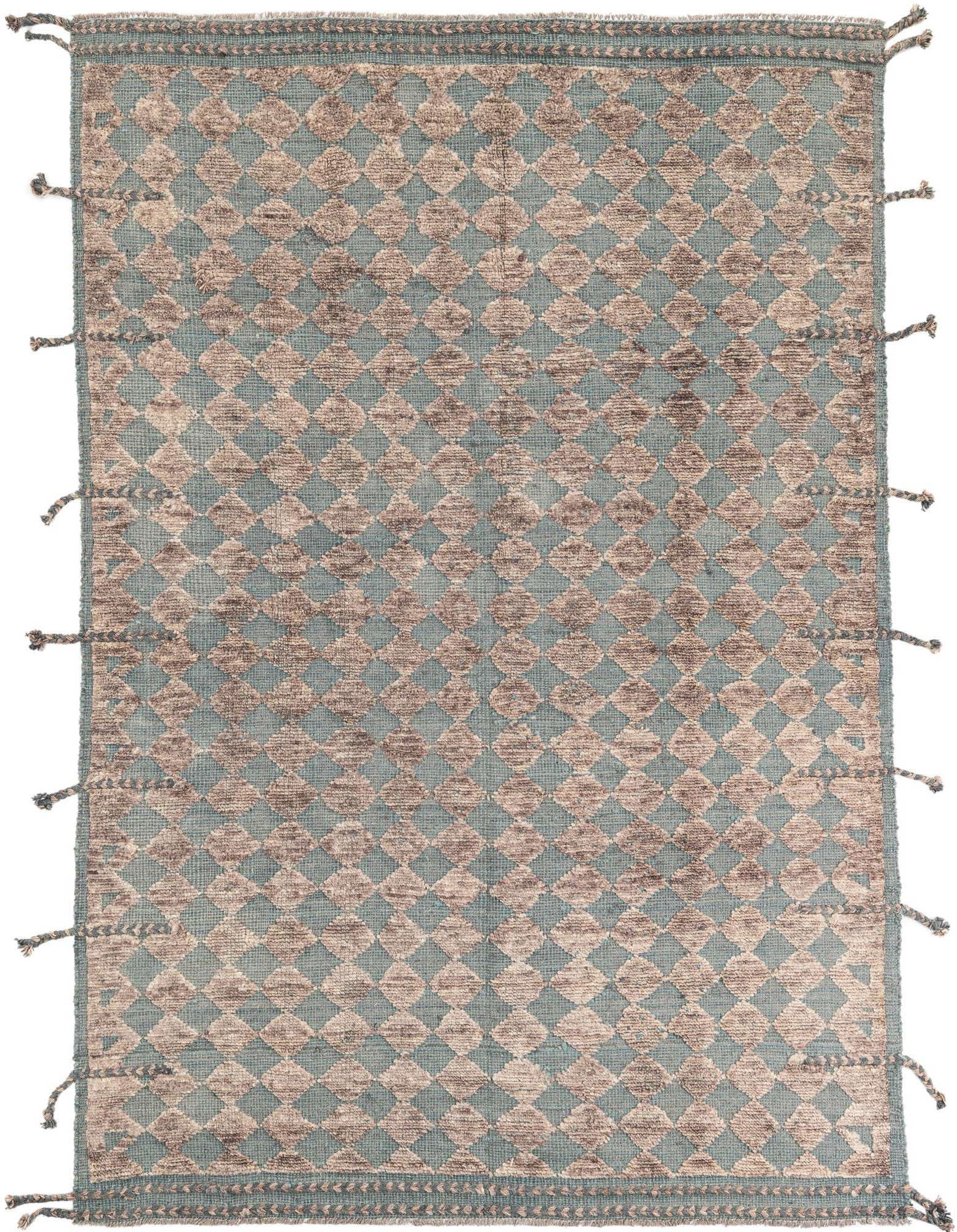 A 6x9 rectangular Moroccan tribal shag rug in varying shades of blue and beige with diamond patterns and tassels.