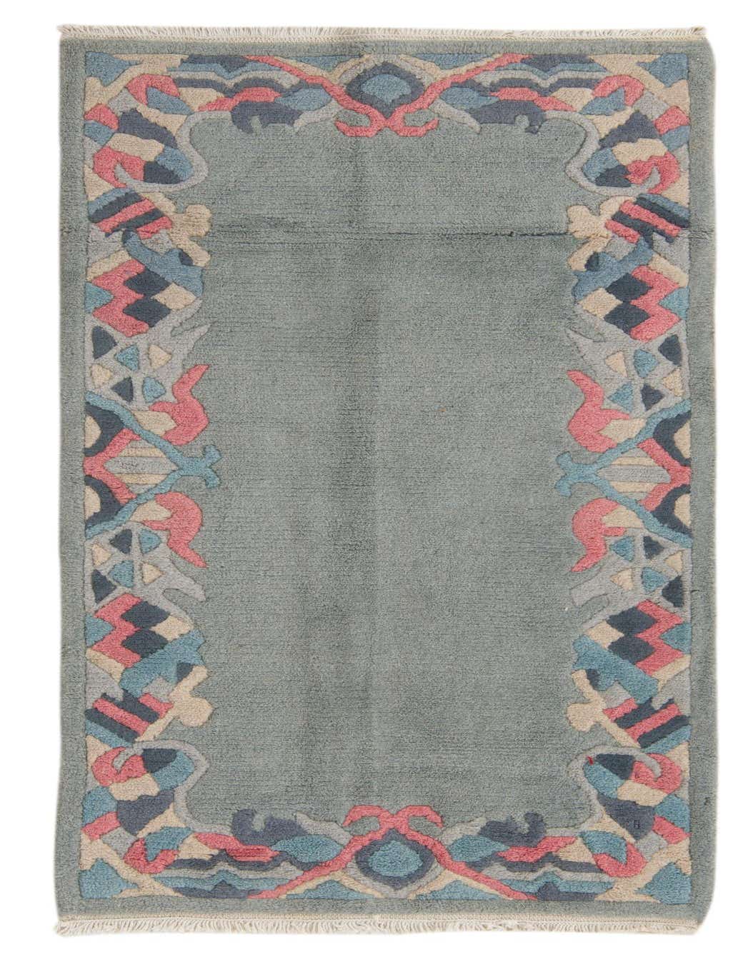 A 3x5 rectangular light blue wool rug with a colorful modern abstract border in pink, blue, and beige.