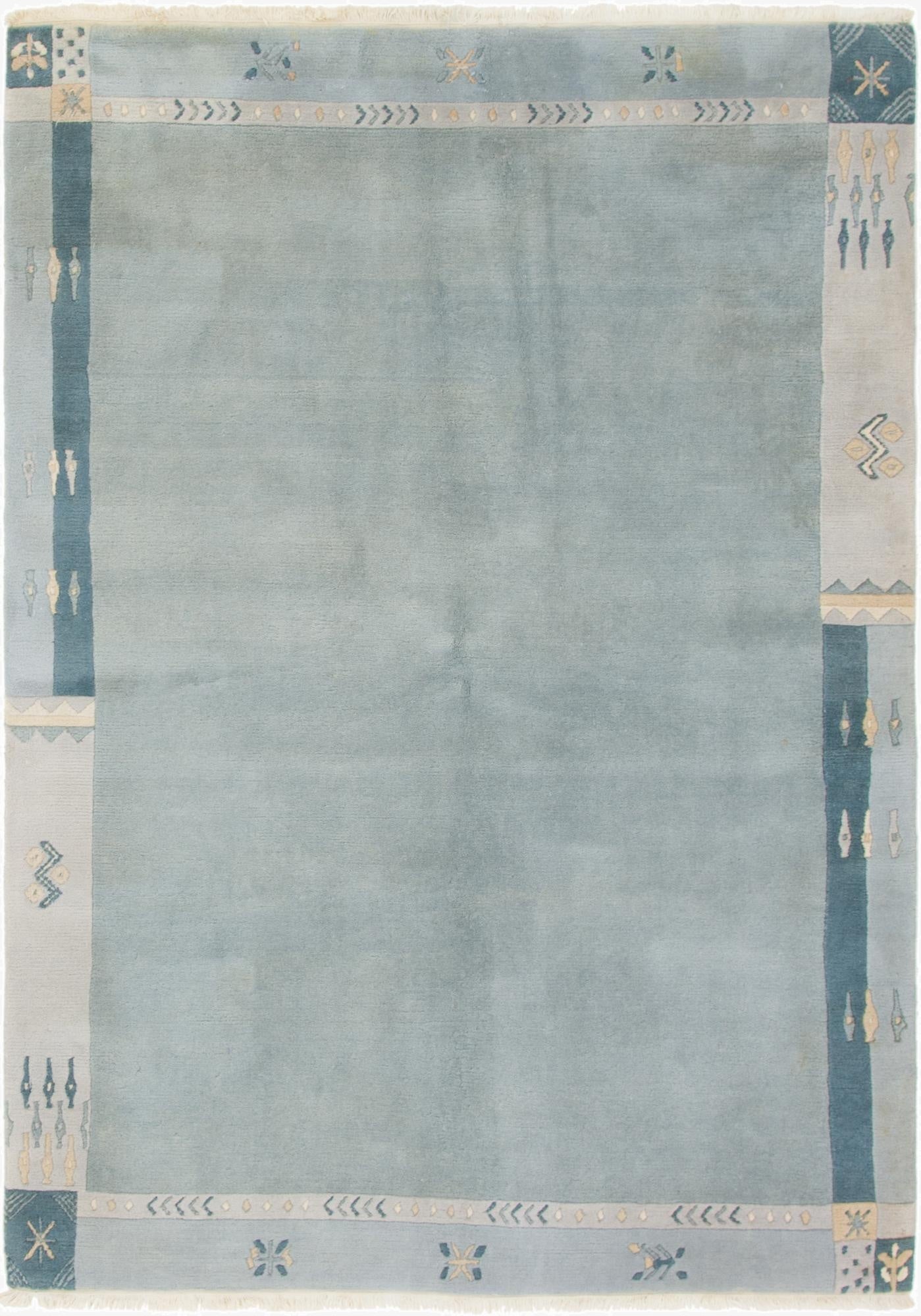  5' 9 x 8'  Hand Knotted Nepal Wool Rug